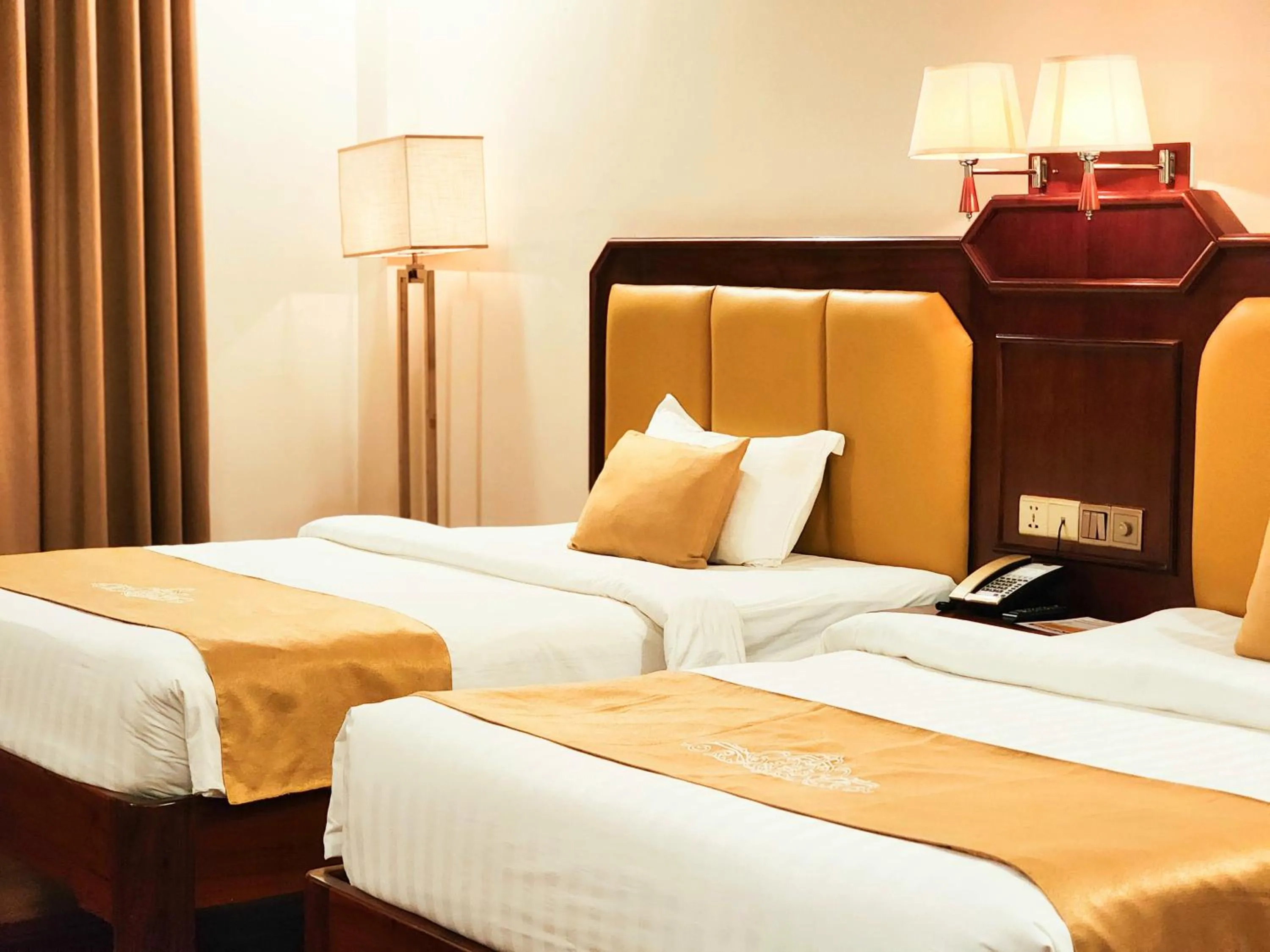 Bed in Lbn Asian Hotel