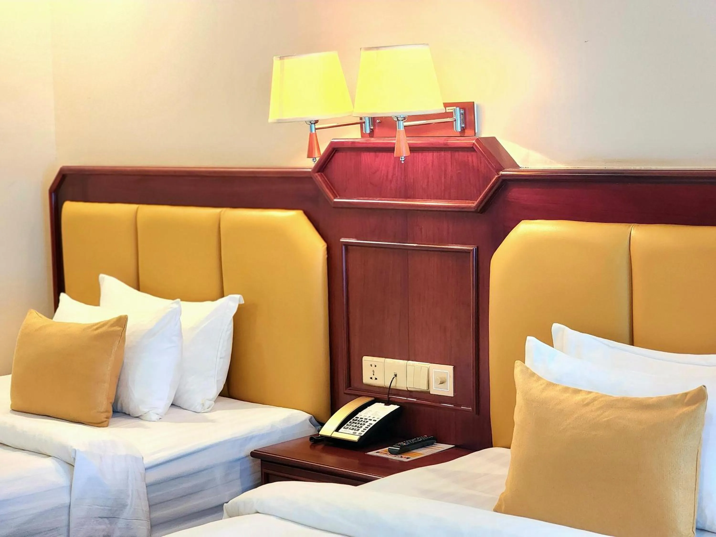 Bed in Lbn Asian Hotel