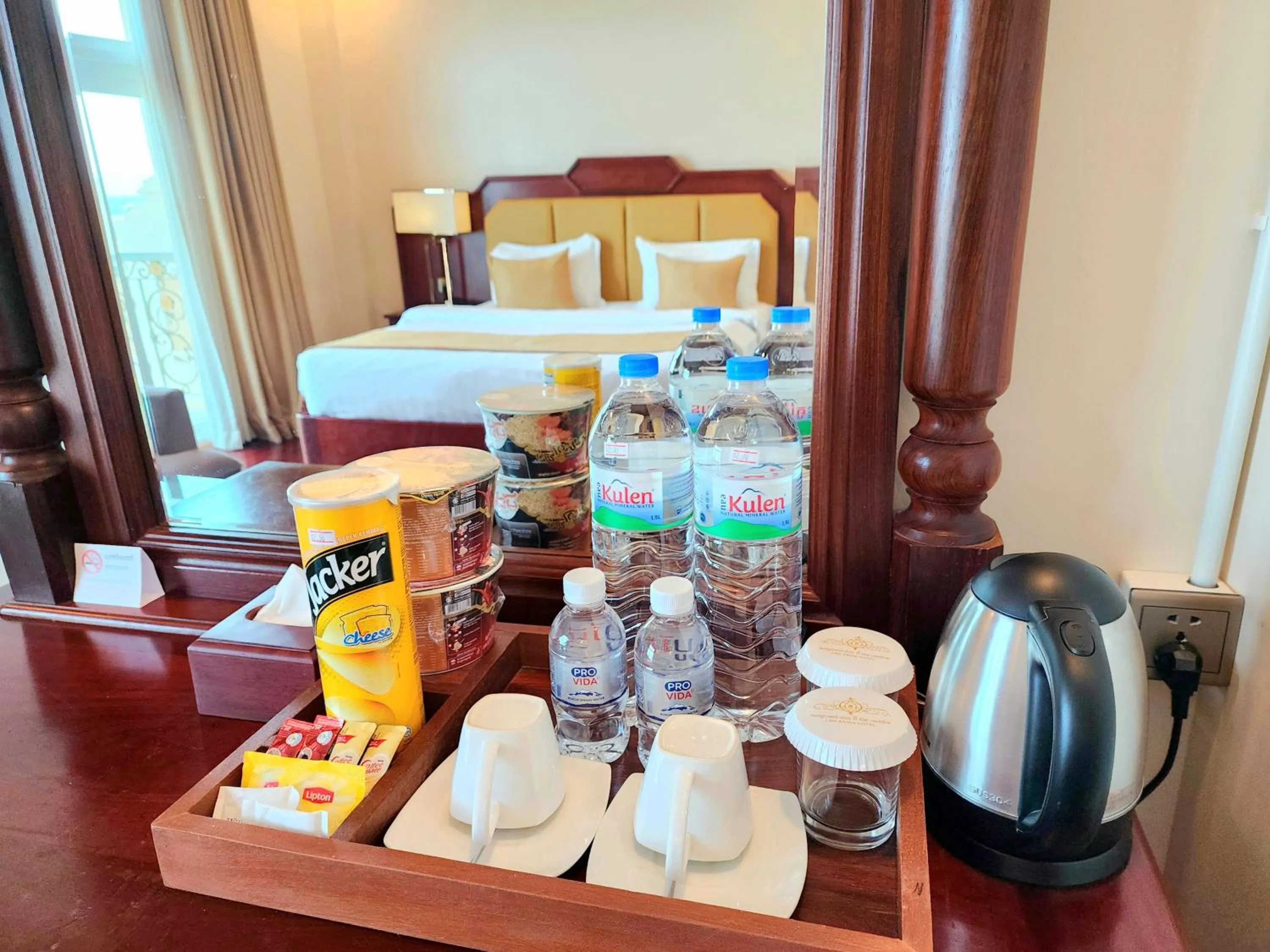 Coffee/tea facilities, Bed in Lbn Asian Hotel
