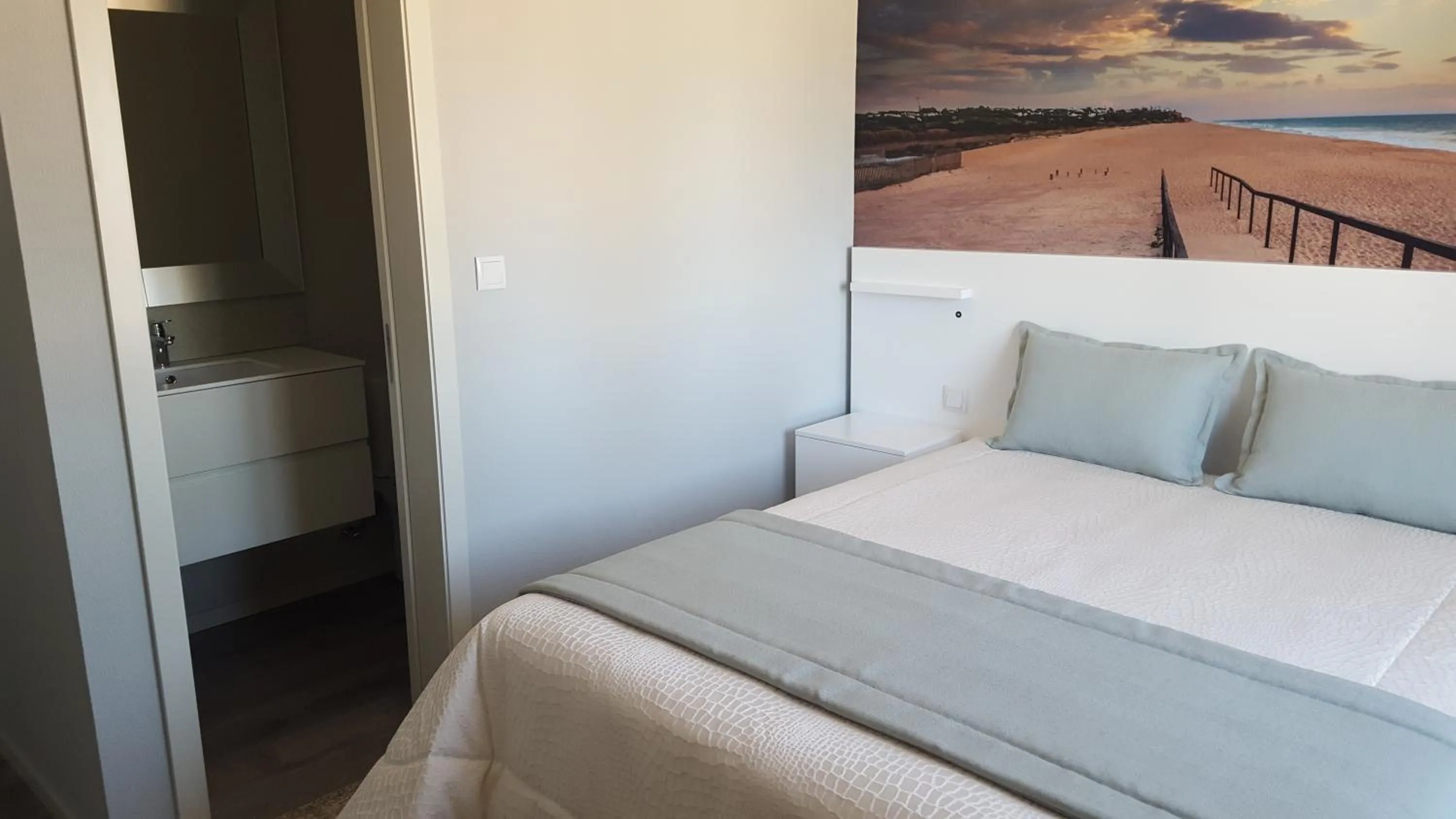 Bed in Golden Beach Guest House & Rooftop Bar