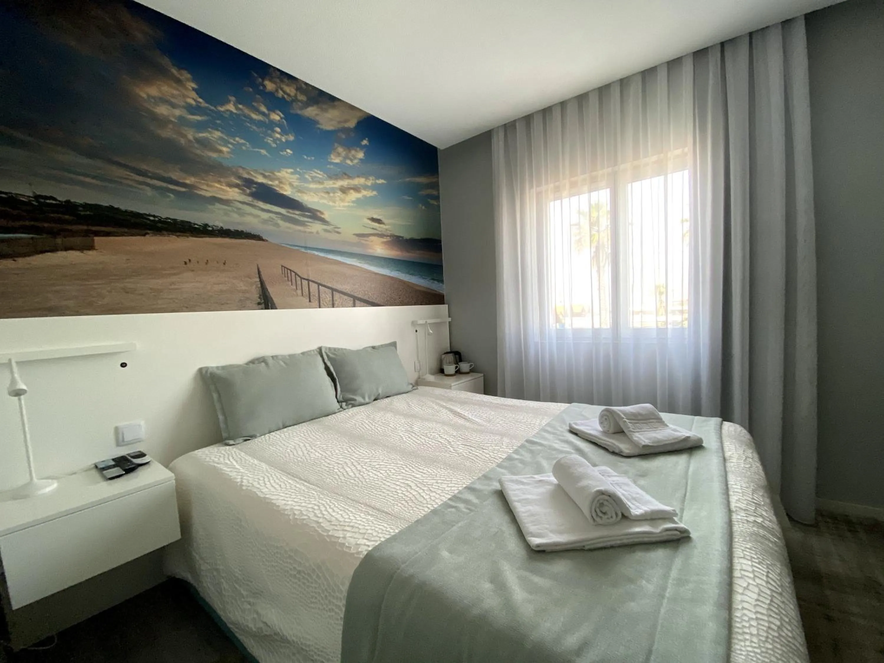 Bed in Golden Beach Guest House & Rooftop Bar