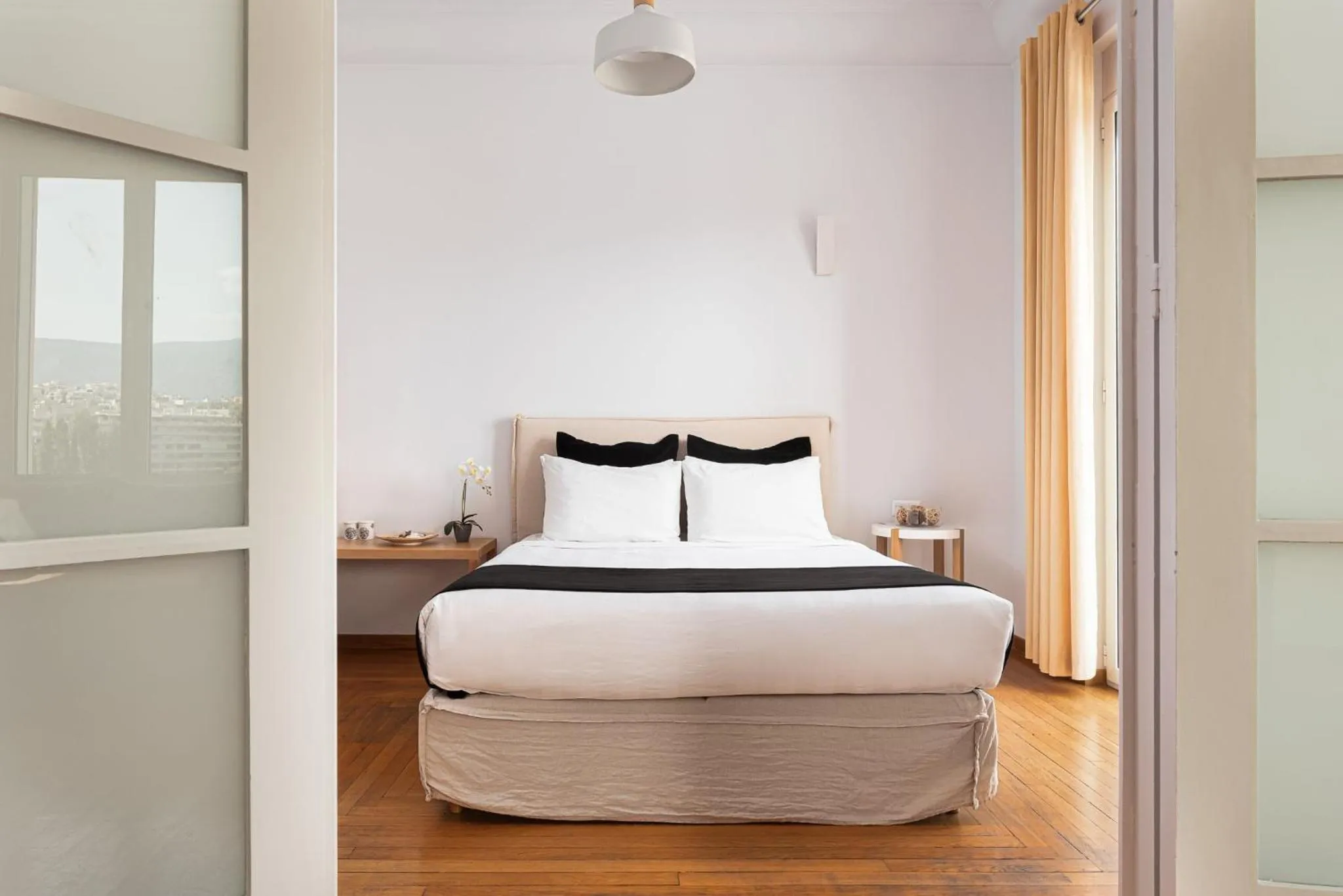 Bed in Acropolis Exclusive Residences