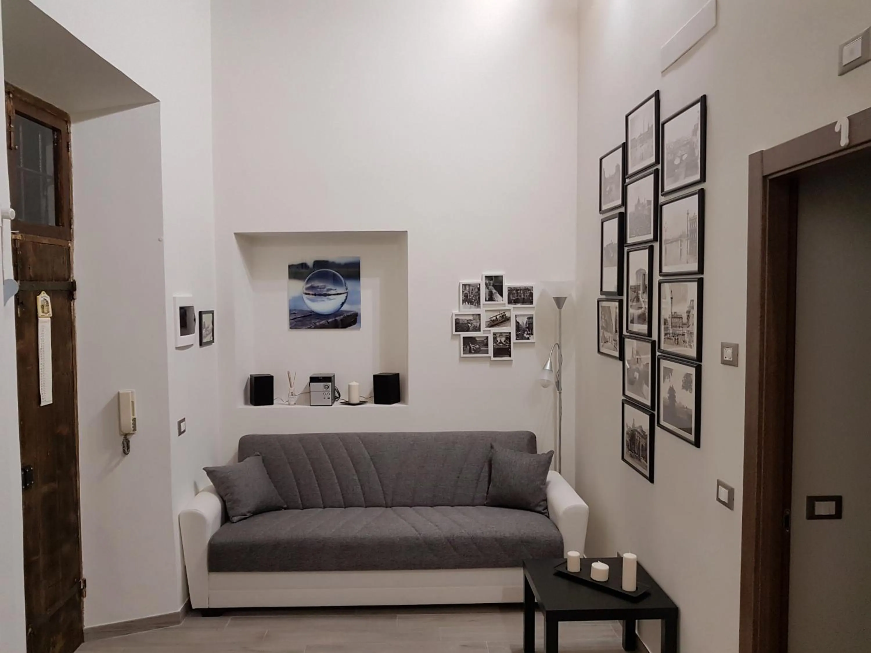 Communal lounge/ TV room in Casa vacanza Furlani