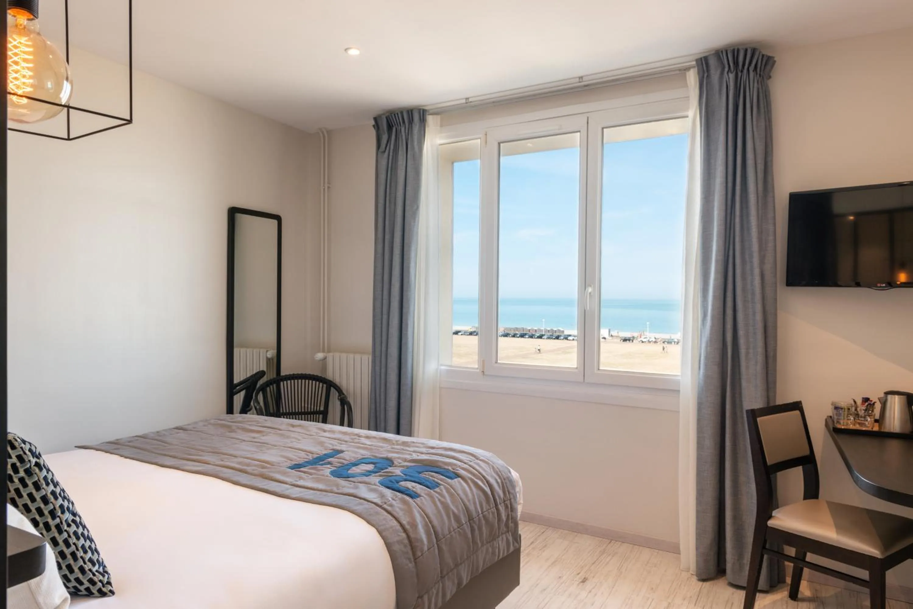Photo of the whole room, Bed in Hôtel de la Plage