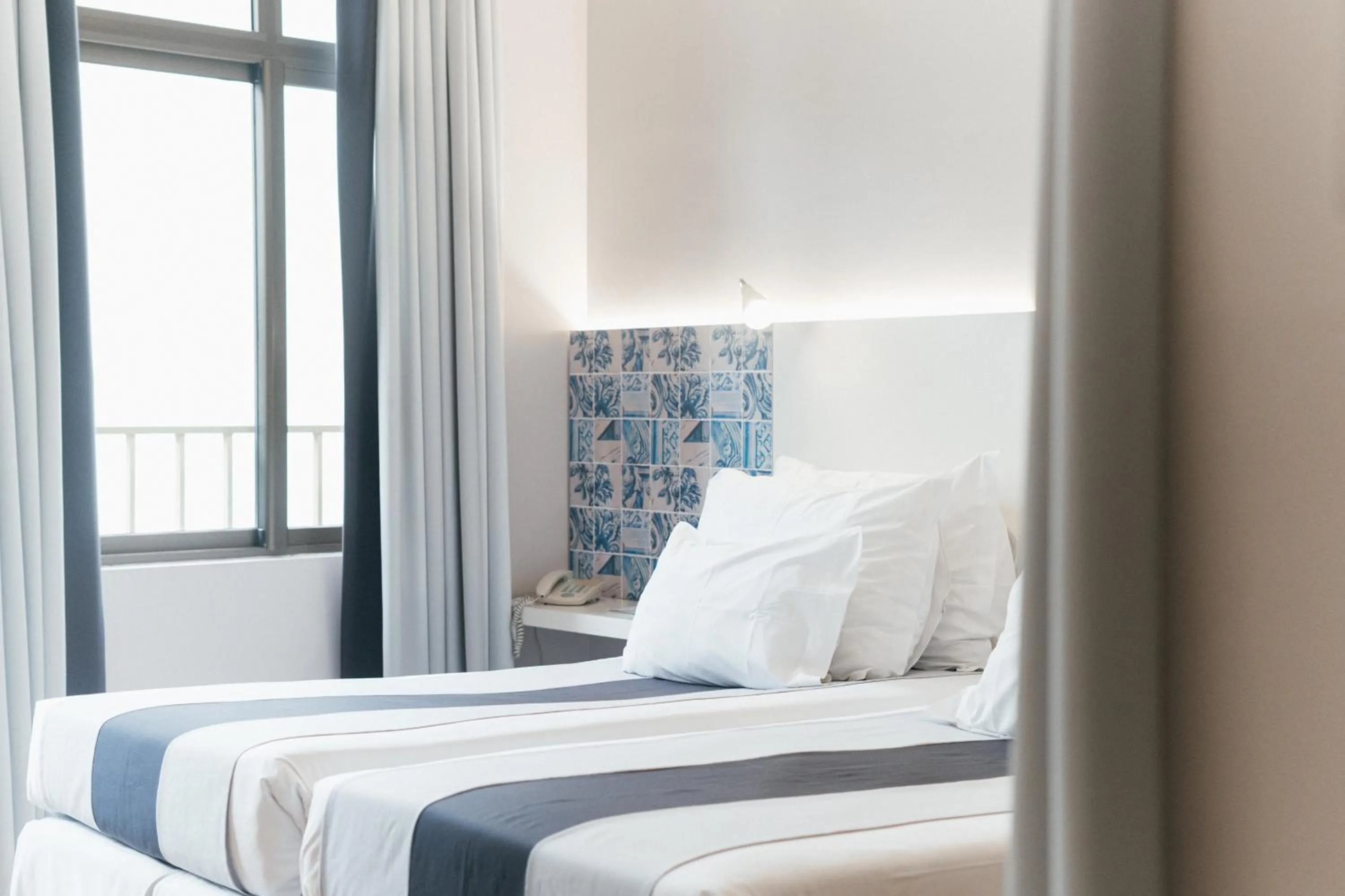 Bed in Sé Boutique Hotel