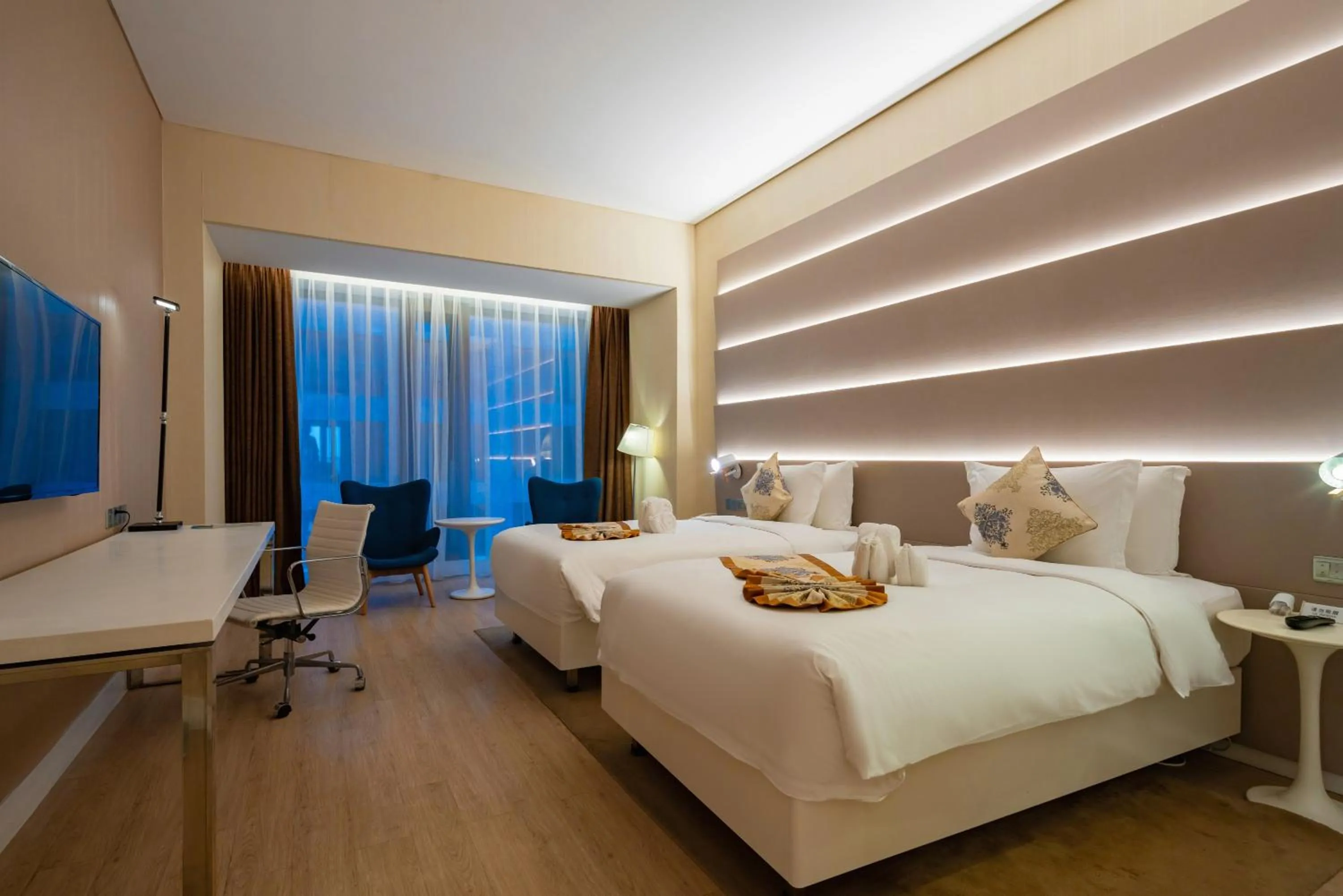 Bed in Sanya Phoenix Airport Hotel