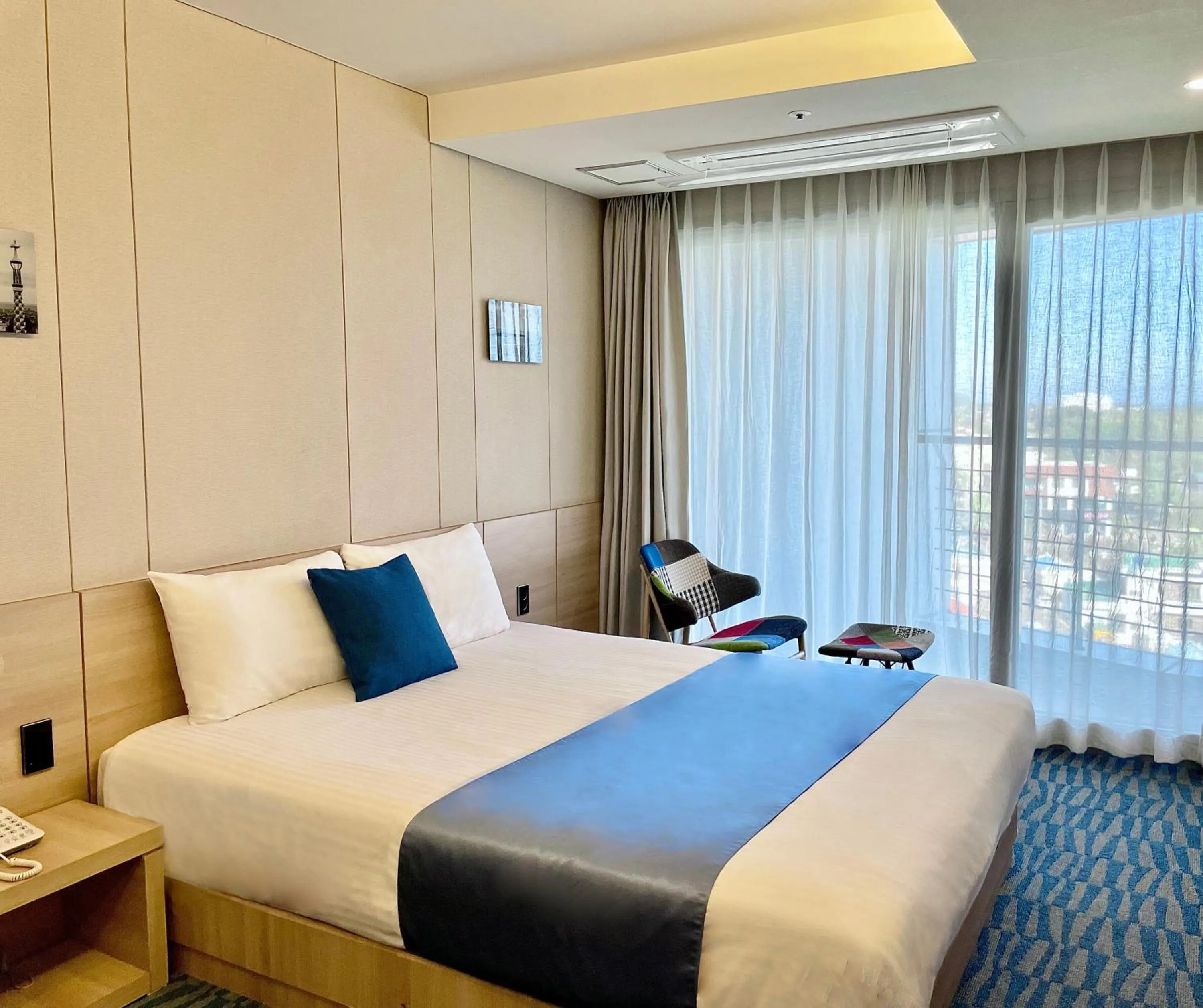 Bed in Hotel bridge Seogwipo