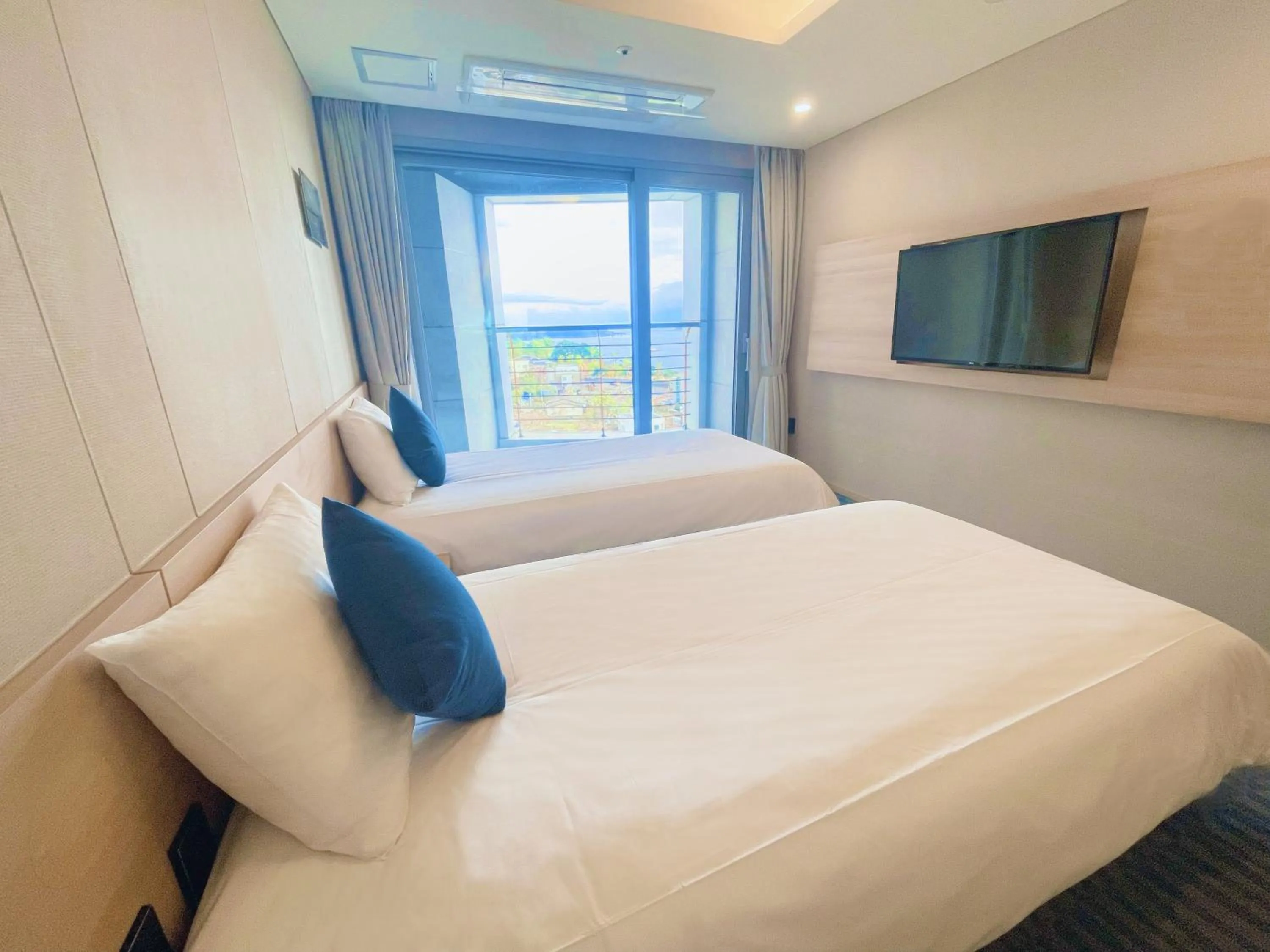 Bed in Hotel bridge Seogwipo