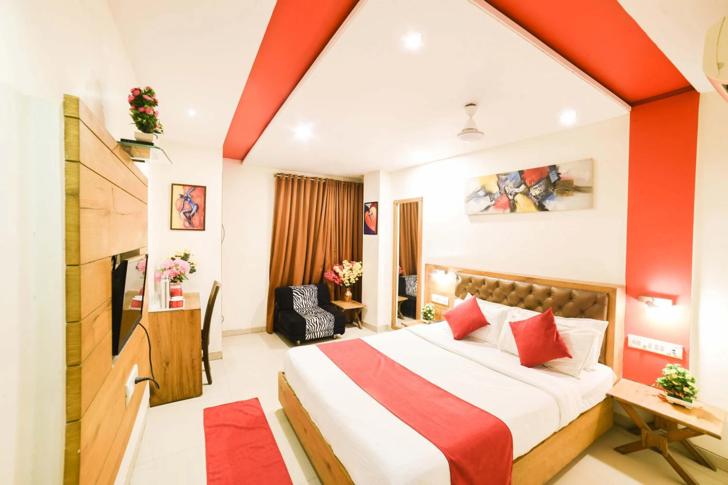 Photo of the whole room, Bed in Hotel Grandeur-Near Mumbai International Airport