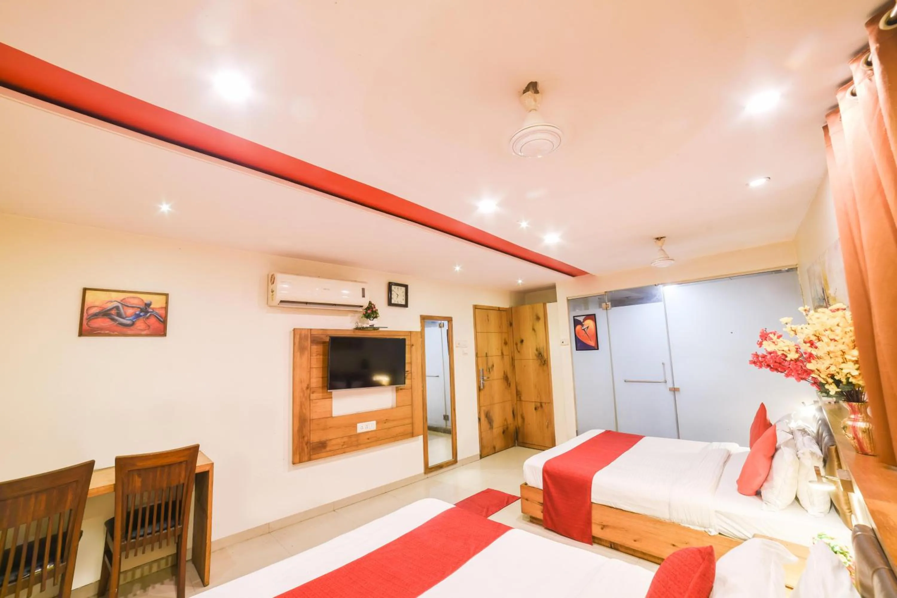 Photo of the whole room, Bed in Hotel Grandeur-Near Mumbai International Airport