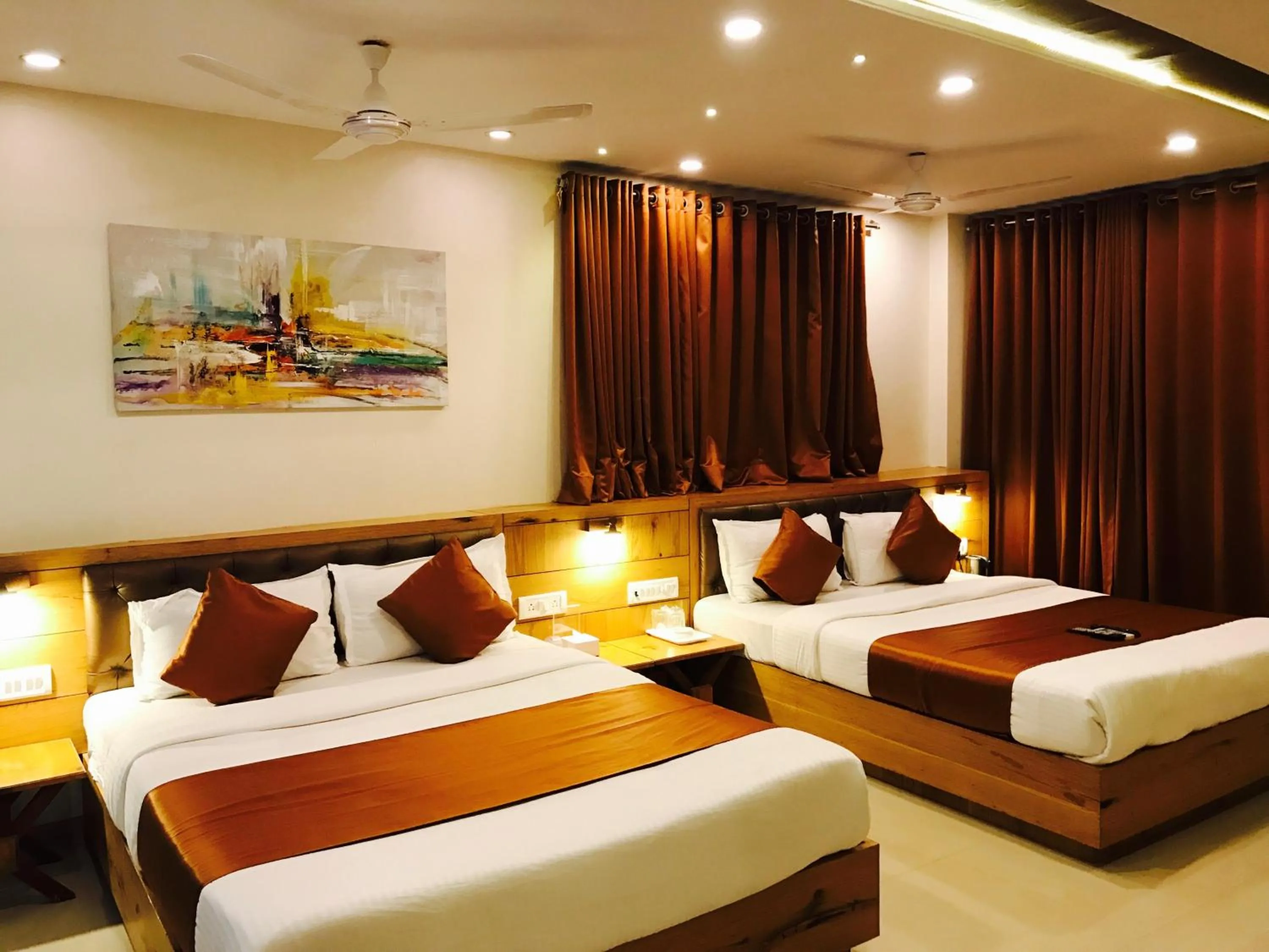 Bed in Hotel Grandeur-Near Mumbai International Airport