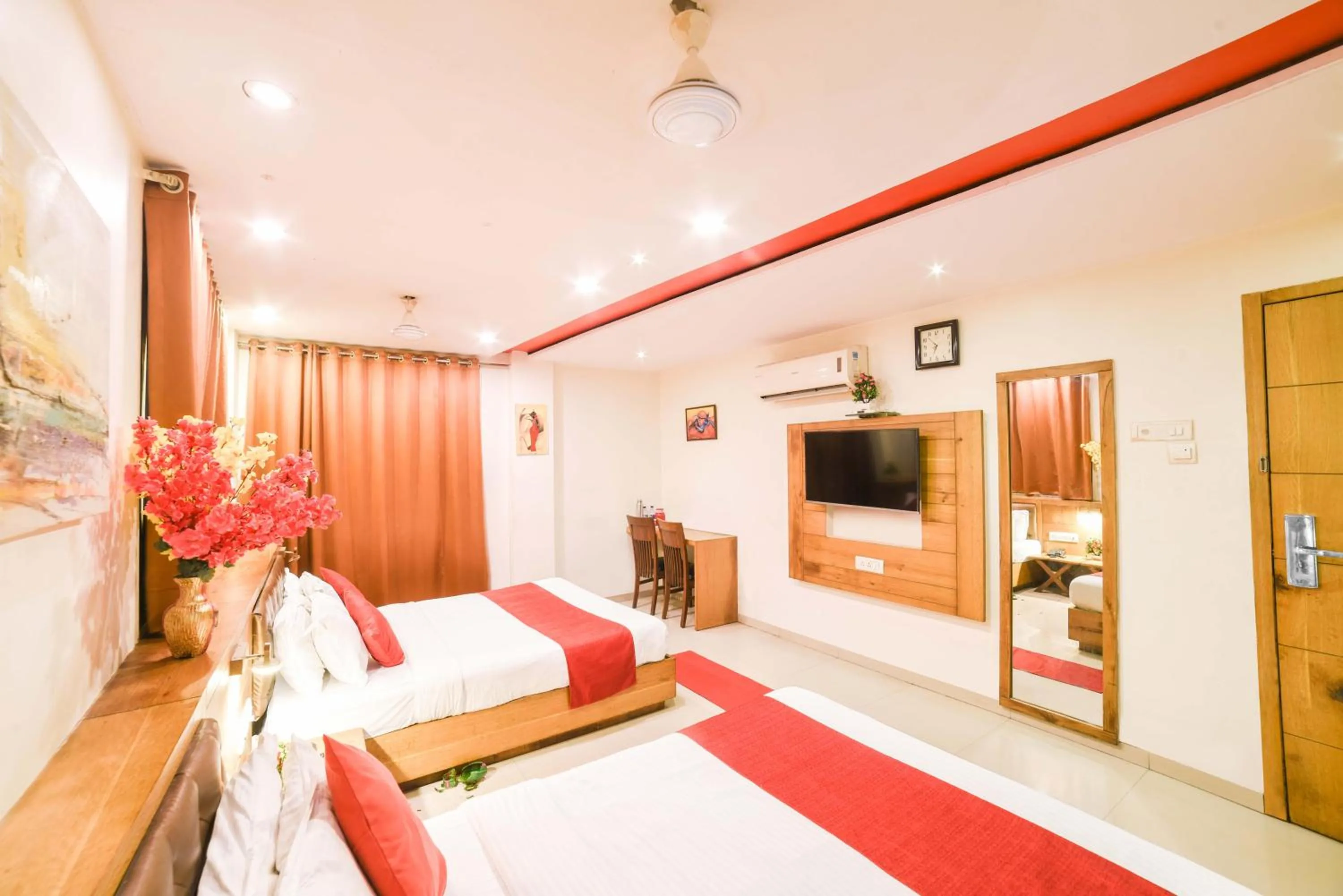 Photo of the whole room, Bed in Hotel Grandeur-Near Mumbai International Airport
