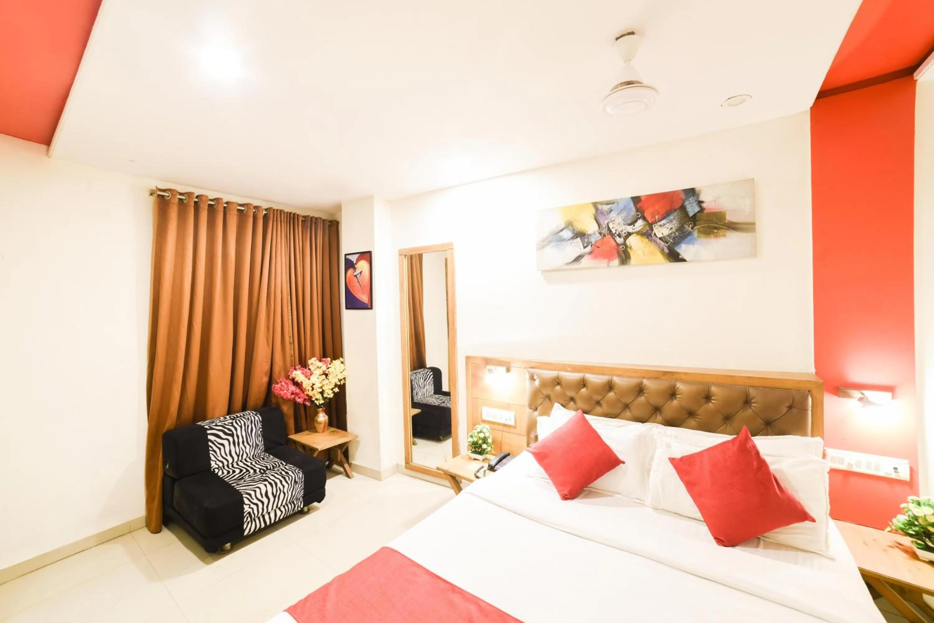 Bed in Hotel Grandeur-Near Mumbai International Airport