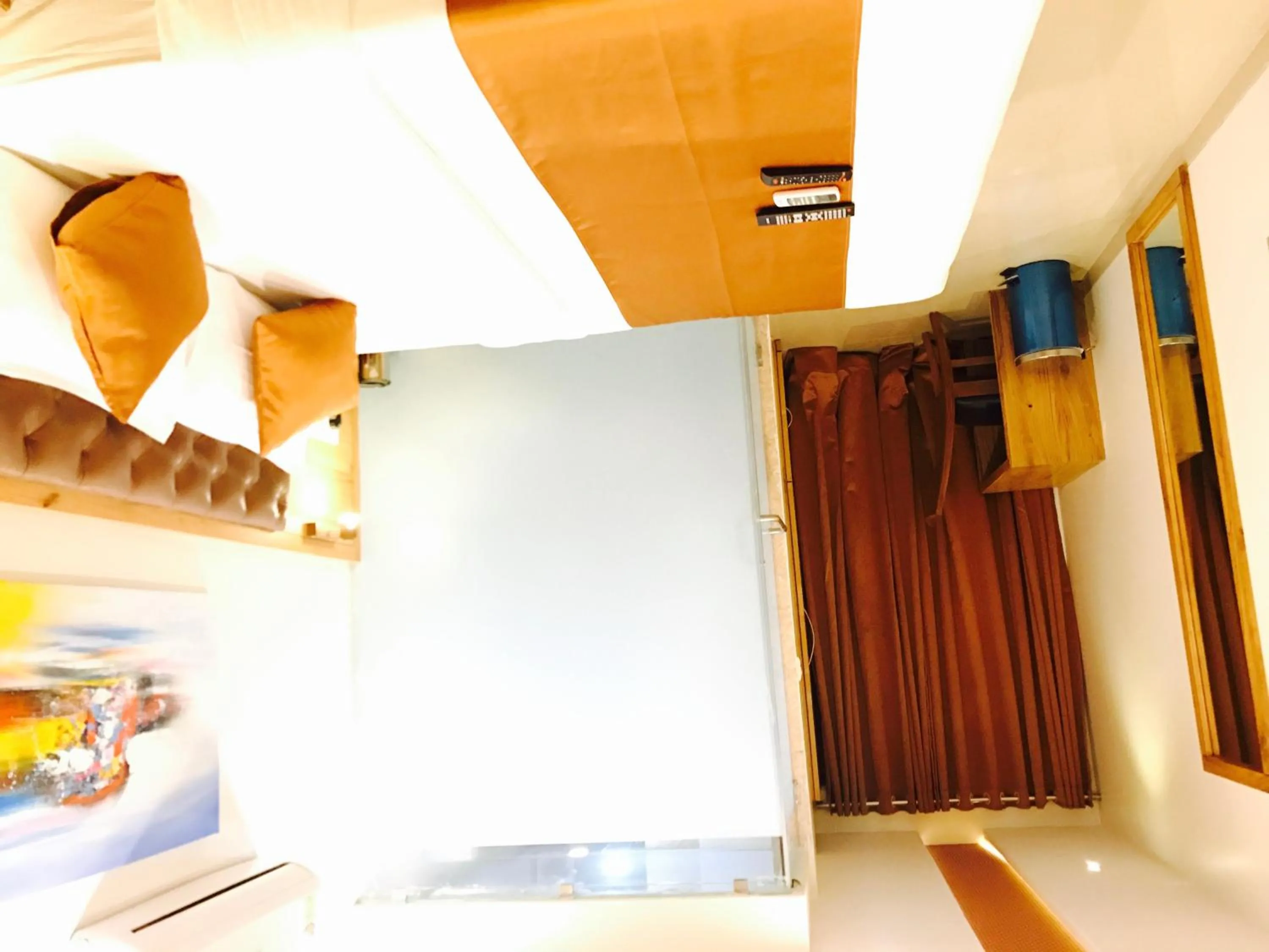 Bed in Hotel Grandeur-Near Mumbai International Airport