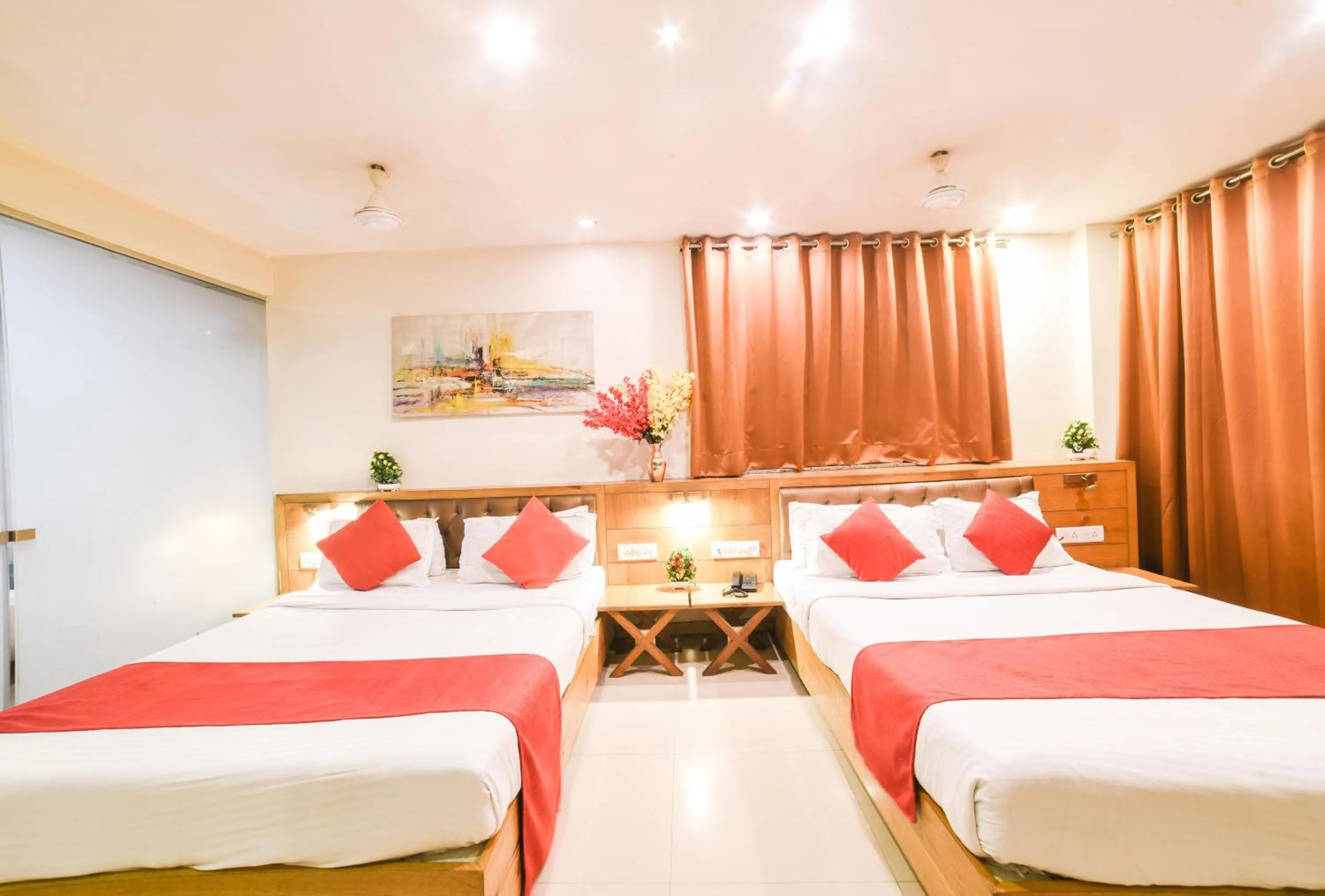 Bed in Hotel Grandeur-Near Mumbai International Airport