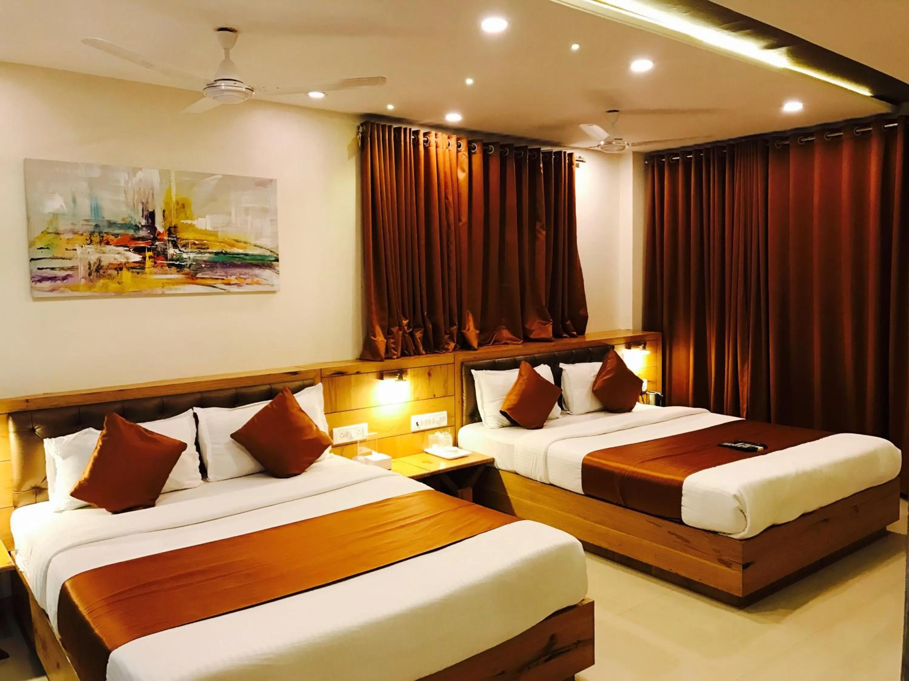 Photo of the whole room, Bed in Hotel Grandeur-Near Mumbai International Airport