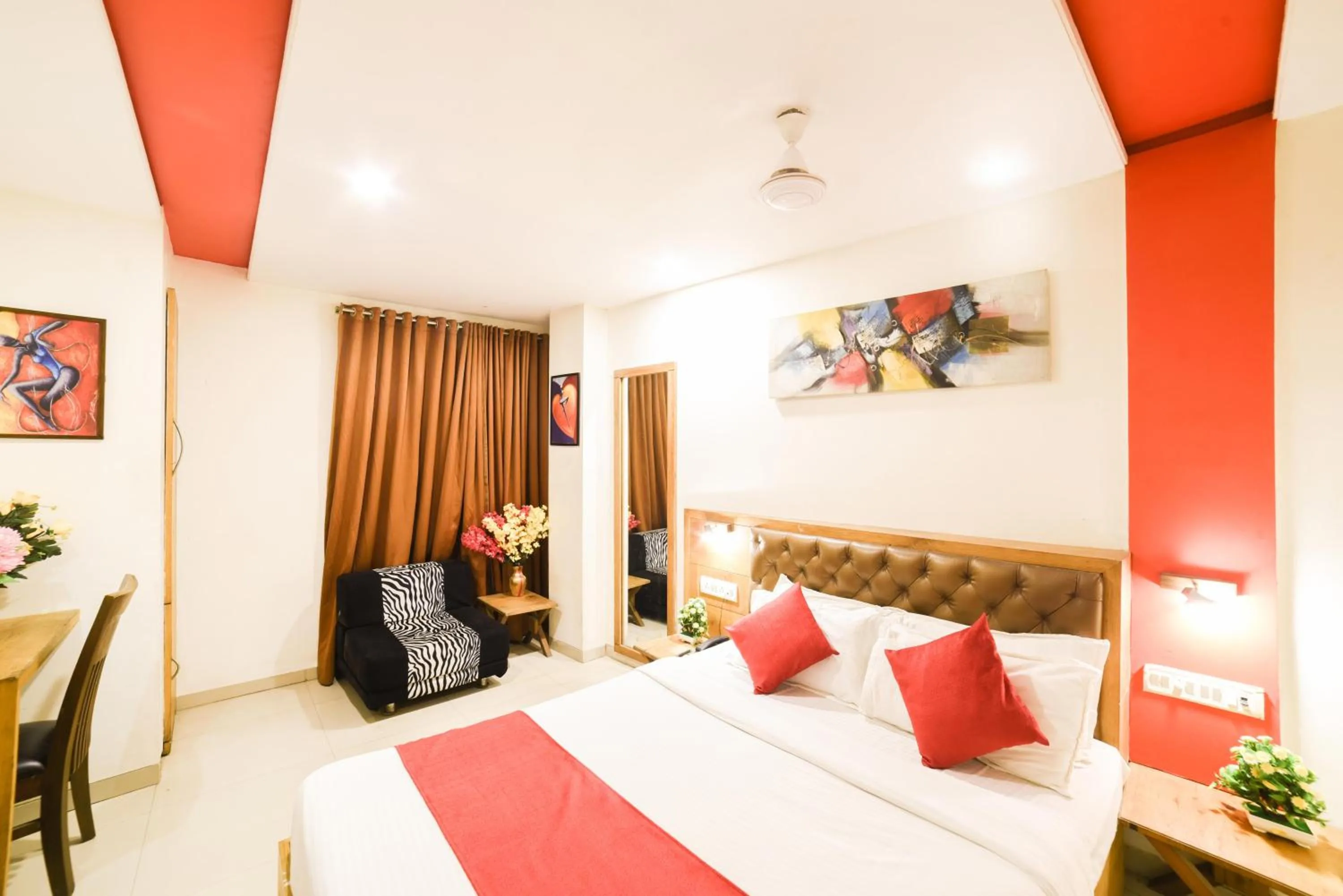 Bed in Hotel Grandeur-Near Mumbai International Airport