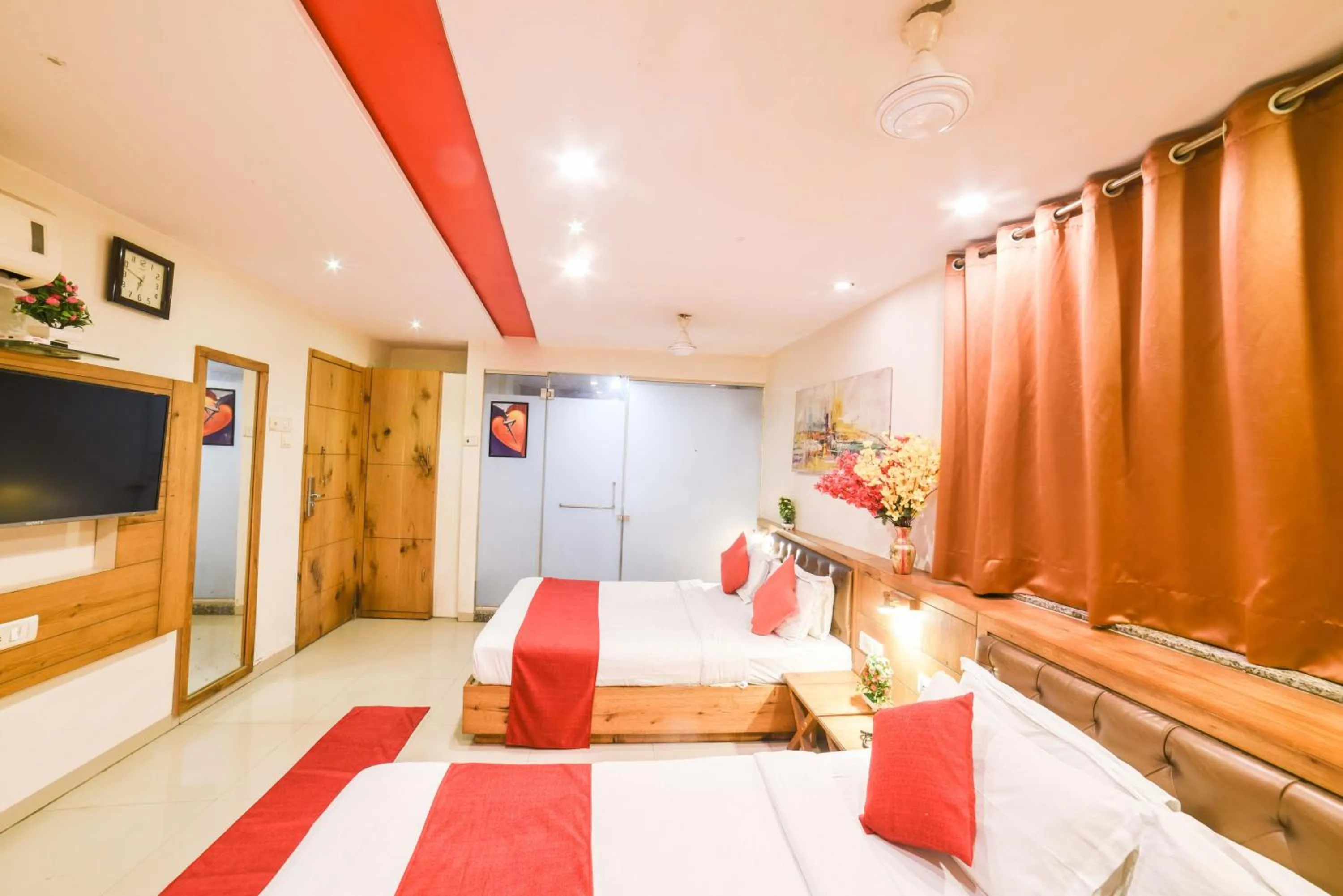 Photo of the whole room, Bed in Hotel Grandeur-Near Mumbai International Airport