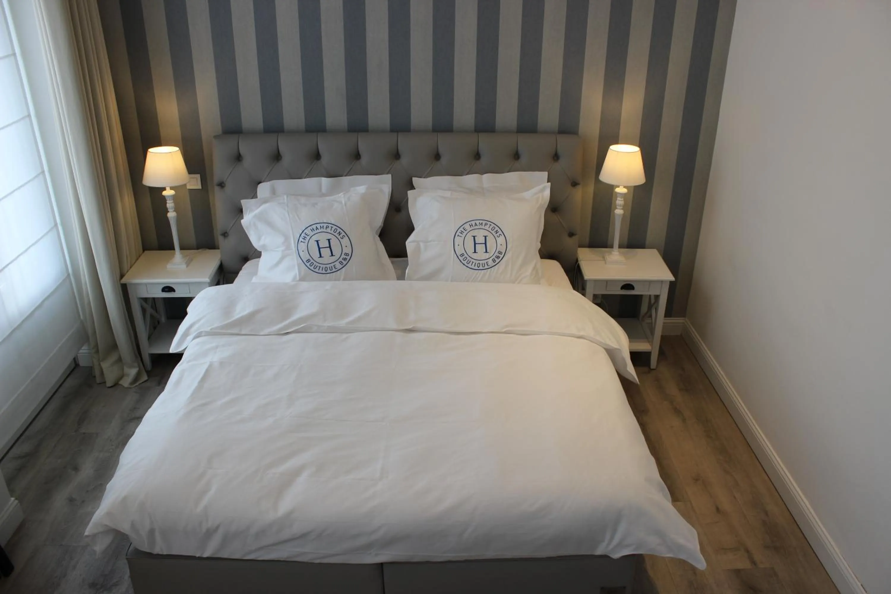 Bed in The Hamptons Boutique Hotel