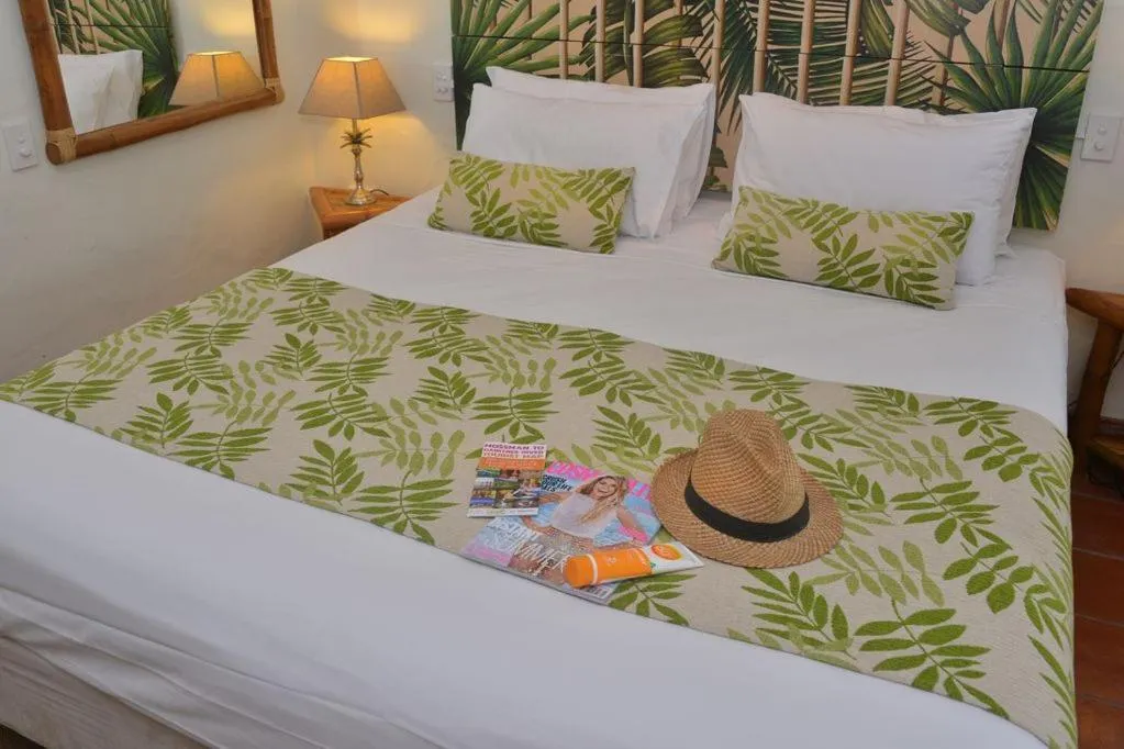 Bed in Turtle Cove Exclusive Island Resort