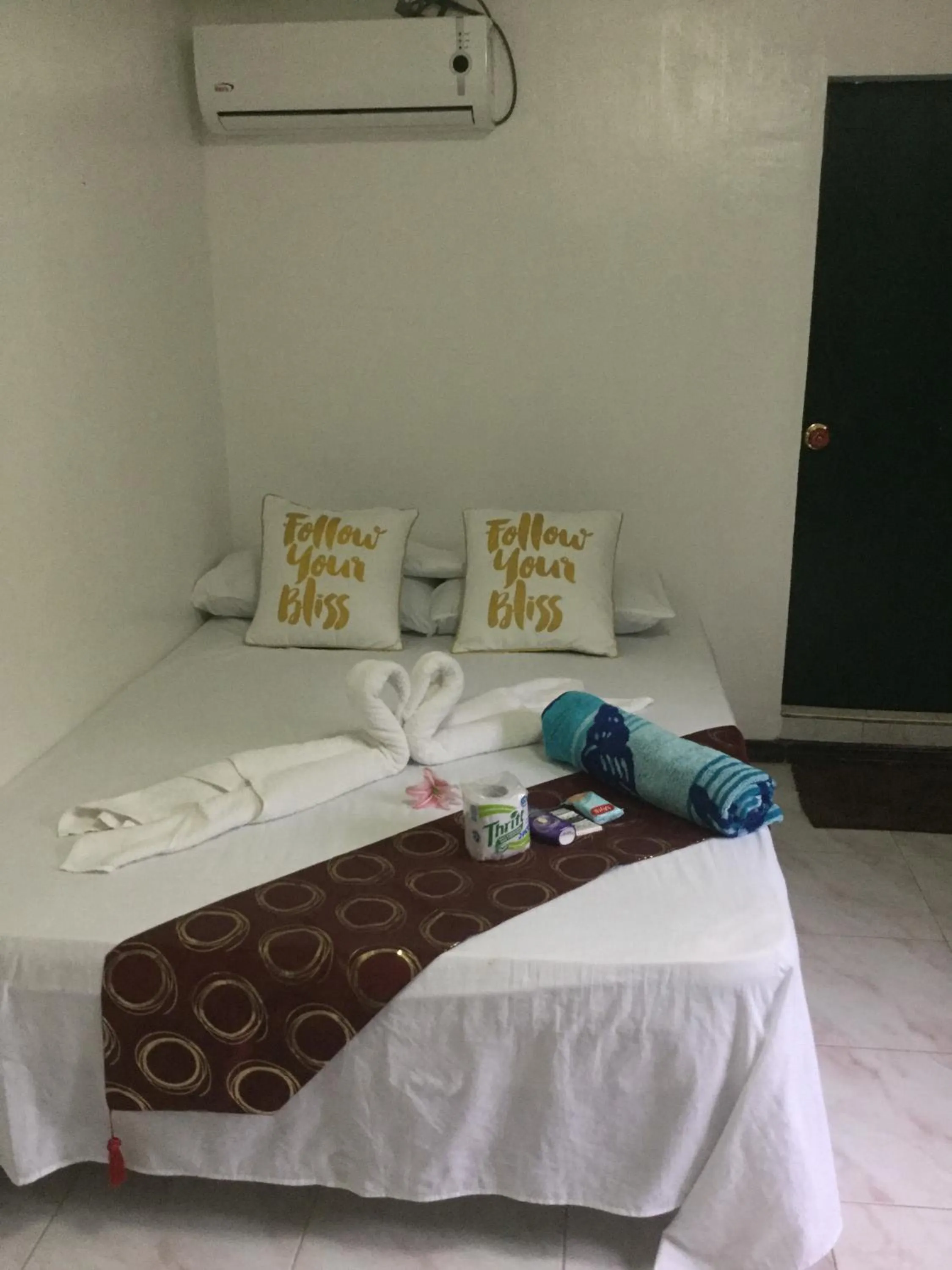 Bed in Turtle Cove Exclusive Island Resort