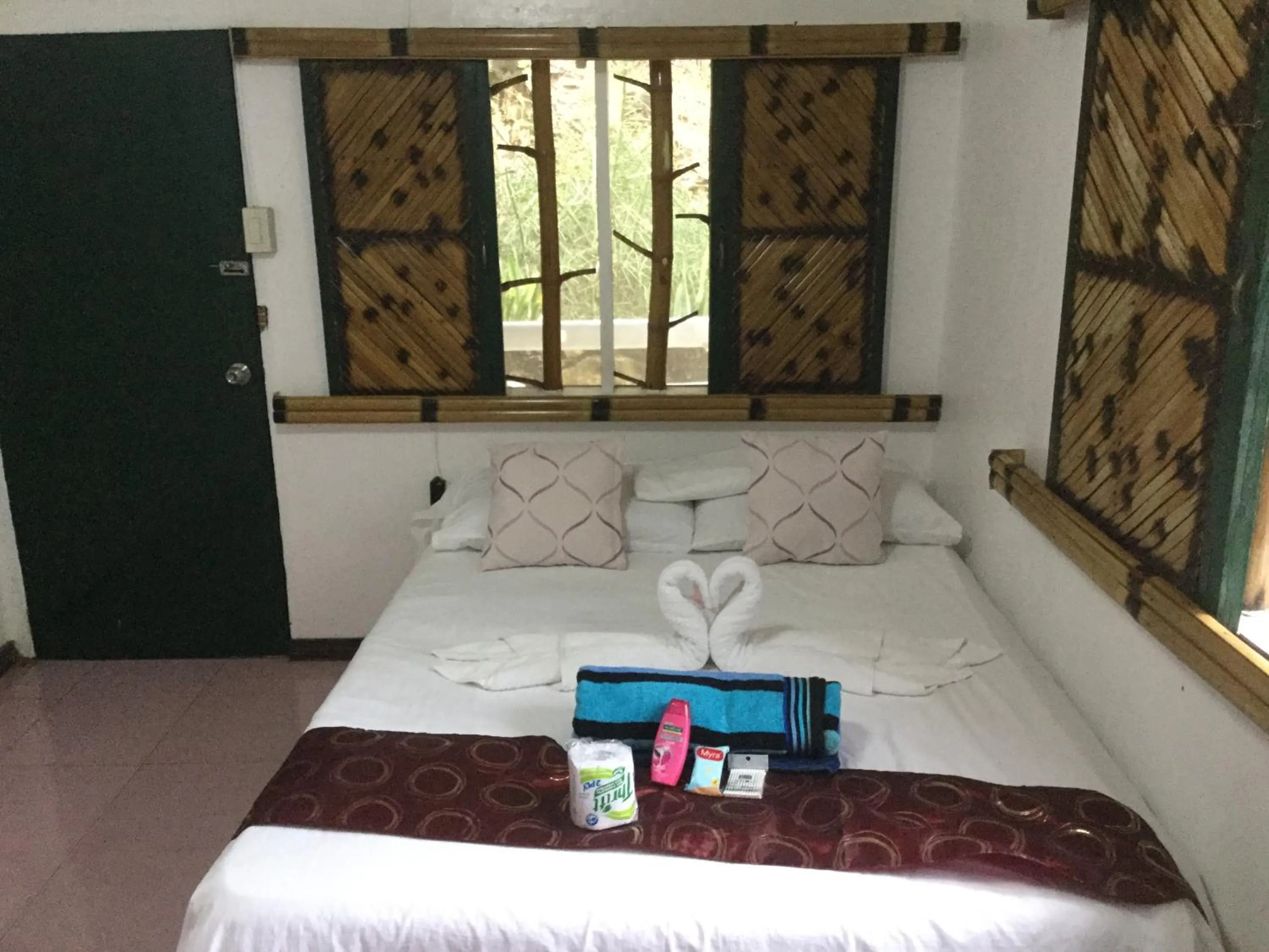 Bed in Turtle Cove Exclusive Island Resort