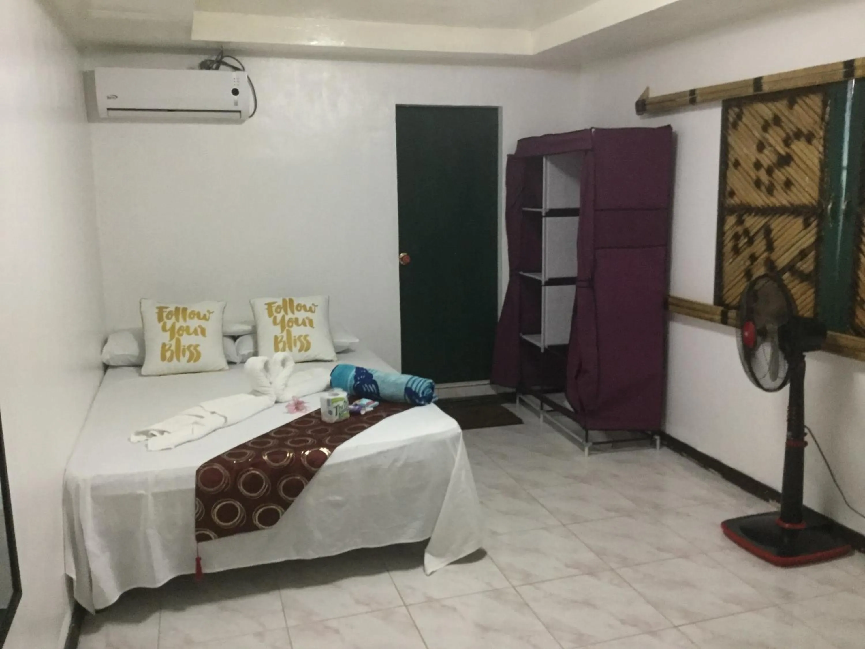 Bed in Turtle Cove Exclusive Island Resort