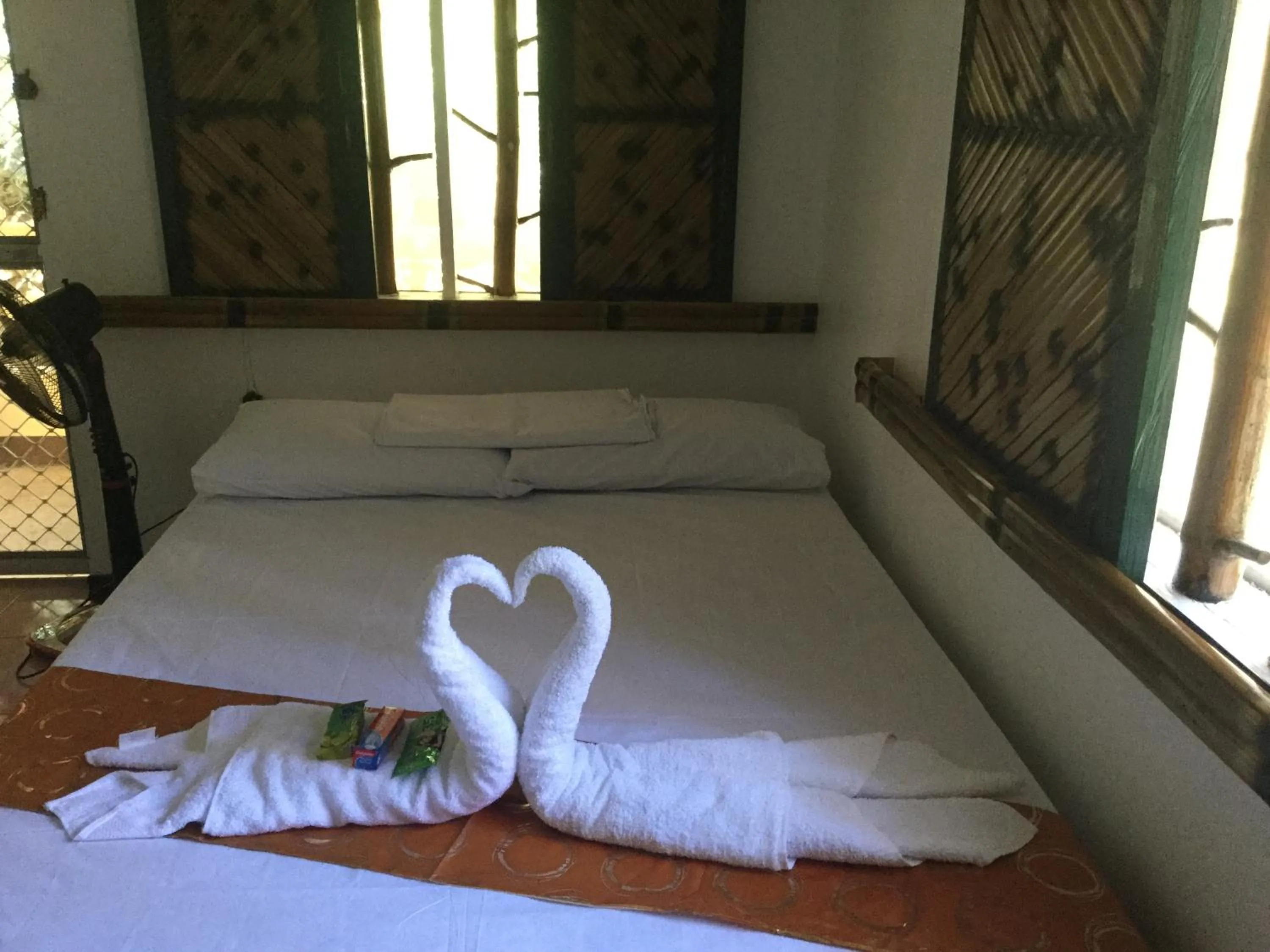 Bed in Turtle Cove Exclusive Island Resort
