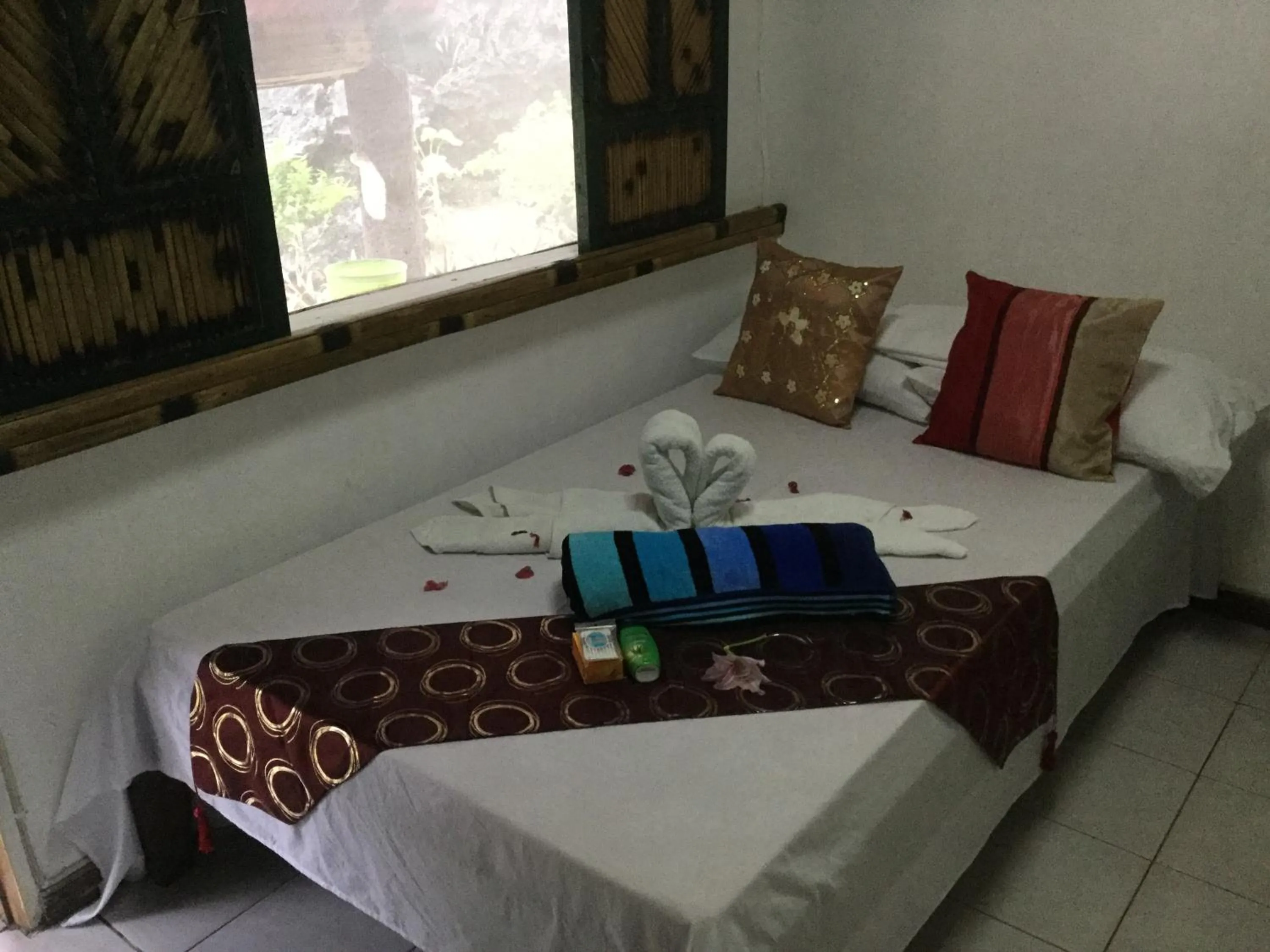 Bed in Turtle Cove Exclusive Island Resort