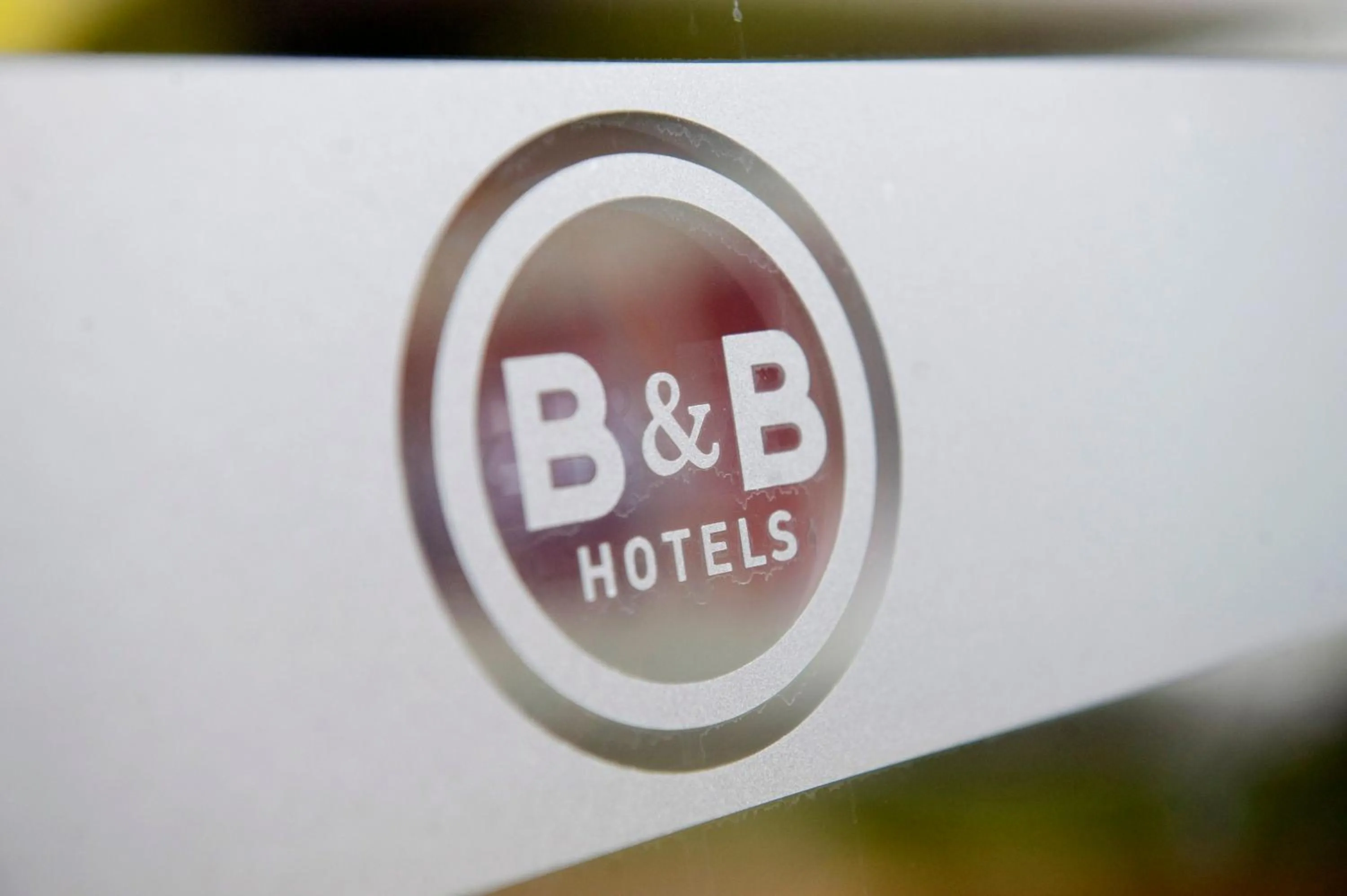 Property logo or sign in B&B HOTEL Saclay