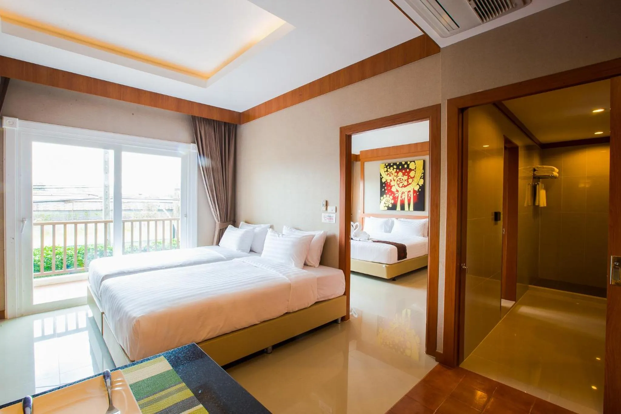 Bed in Romantic Khon Kaen Hotel