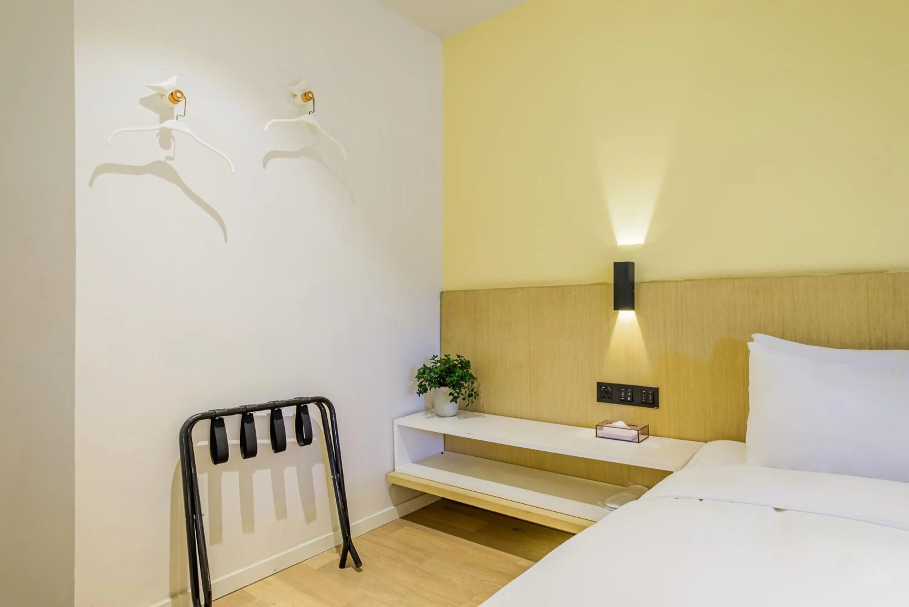 Decorative detail, Bed in PACE HOTEL Suzhou Renmin Branch