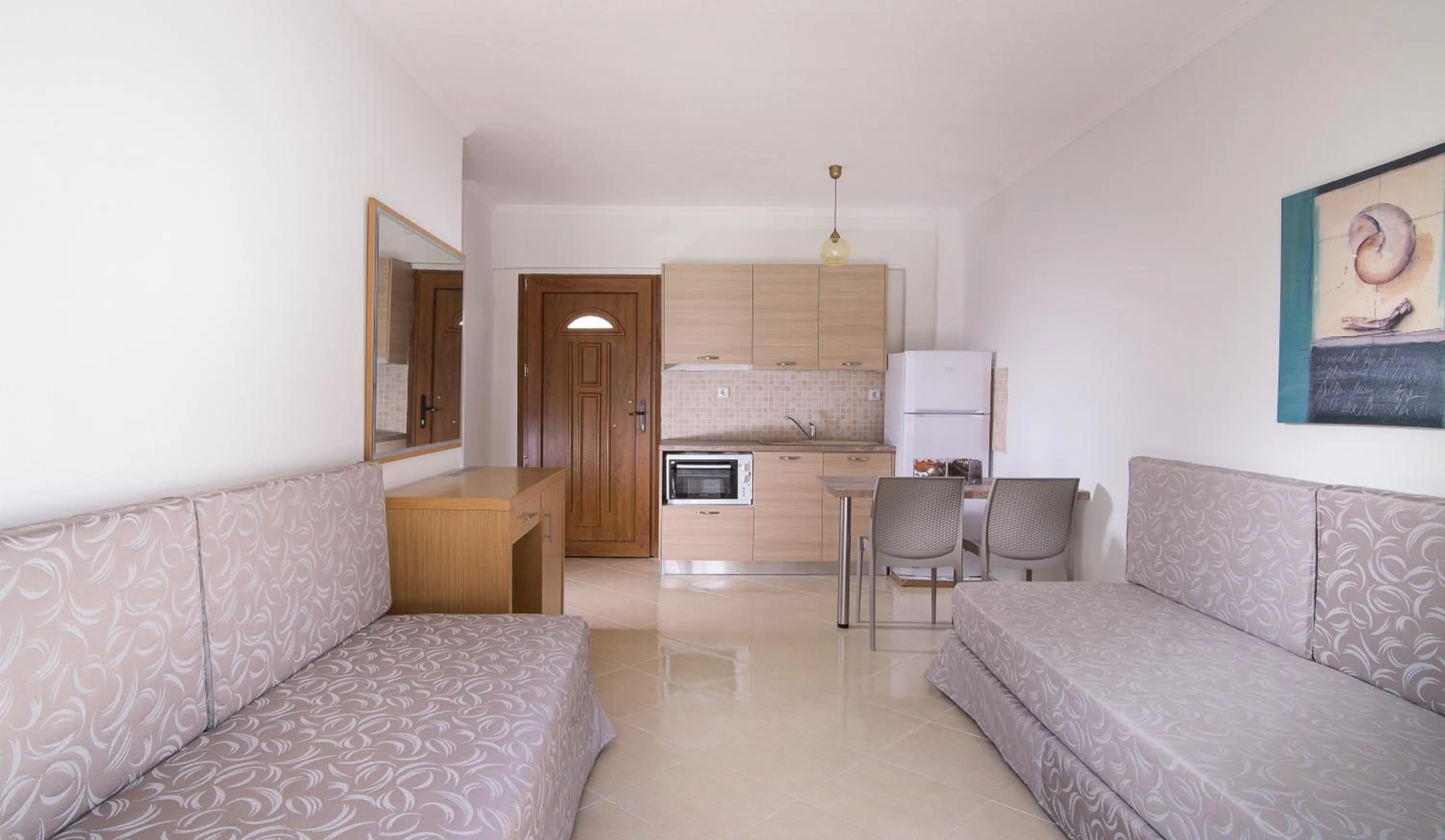 Kitchen or kitchenette in Apanemia by Flegra Hotels
