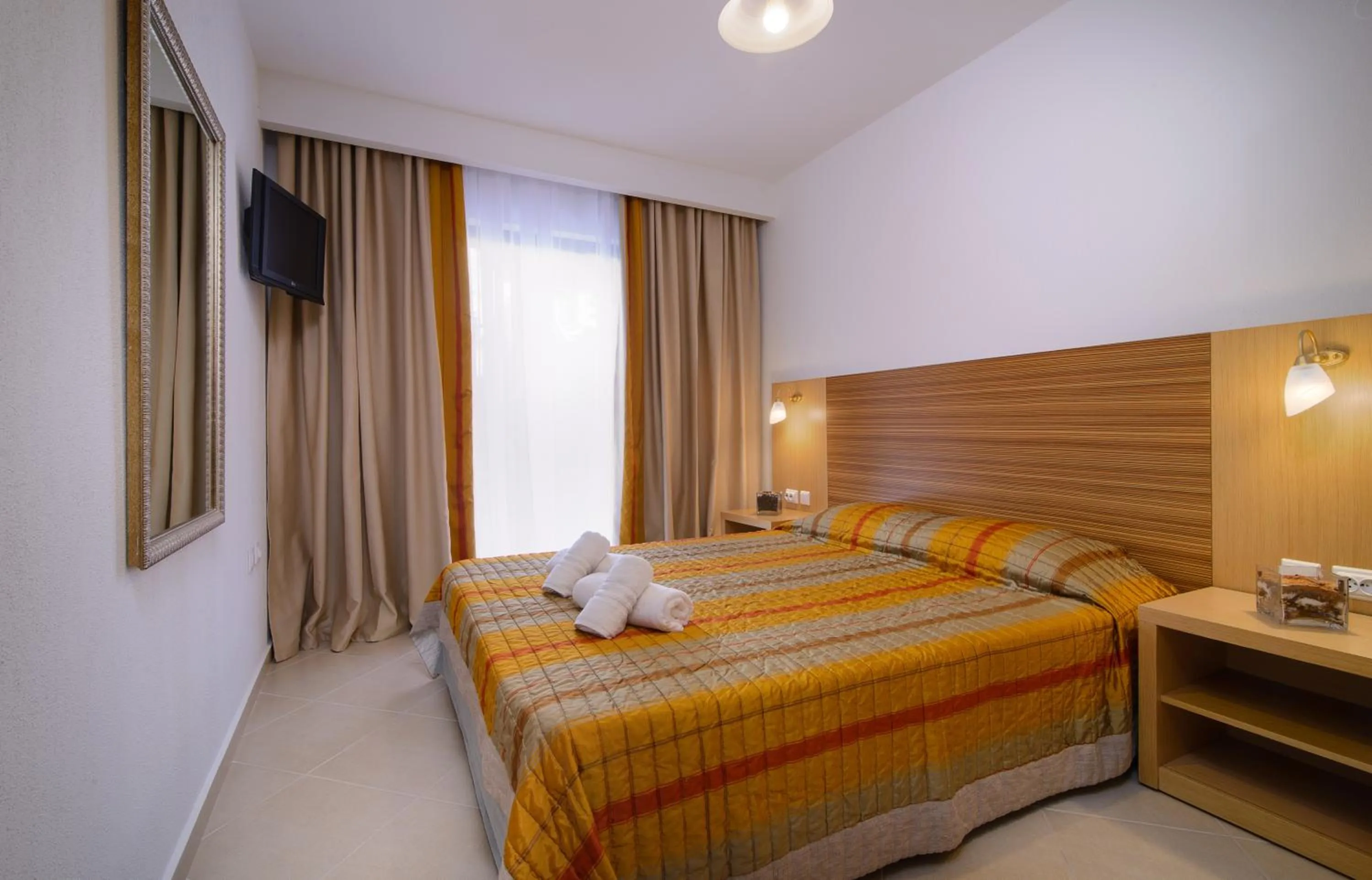 Photo of the whole room, Bed in Apanemia by Flegra Hotels