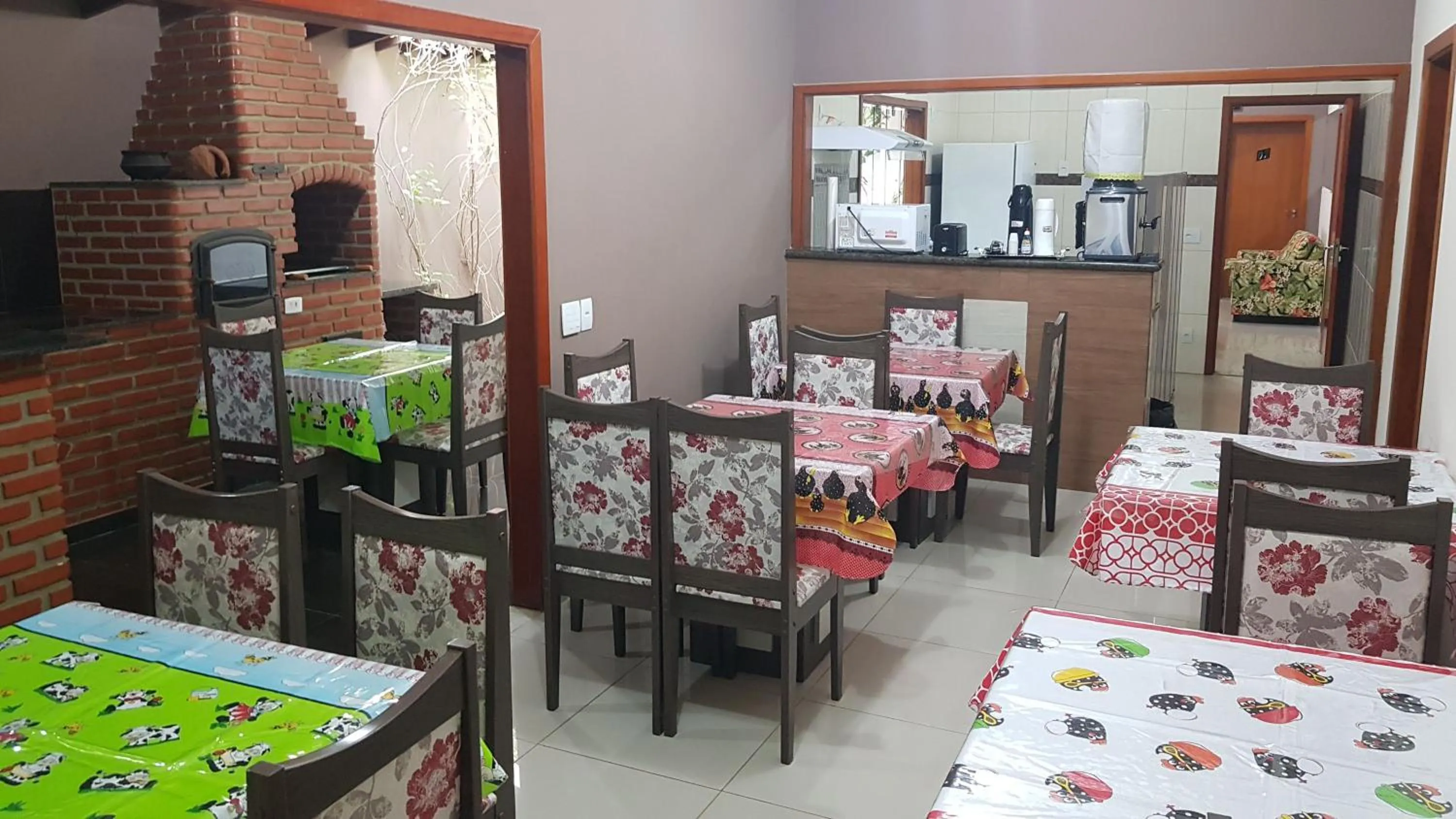 Communal lounge/ TV room, Bed in Pousada Pimenta Olimpia