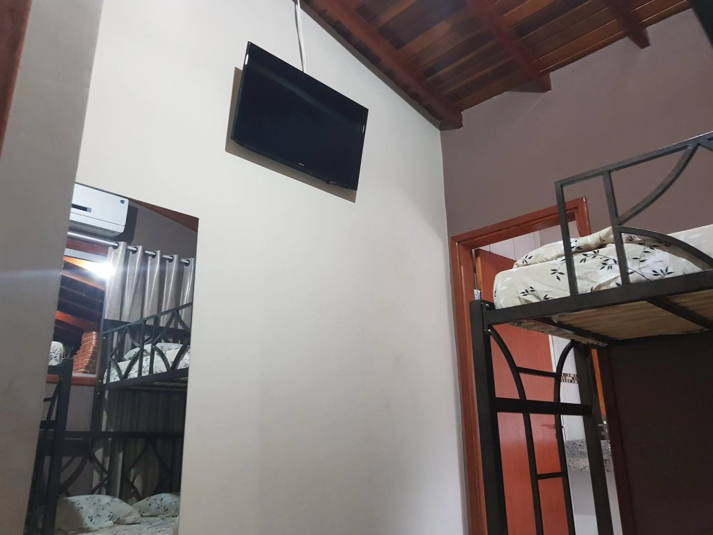 Communal lounge/ TV room, Bed in Pousada Pimenta Olimpia