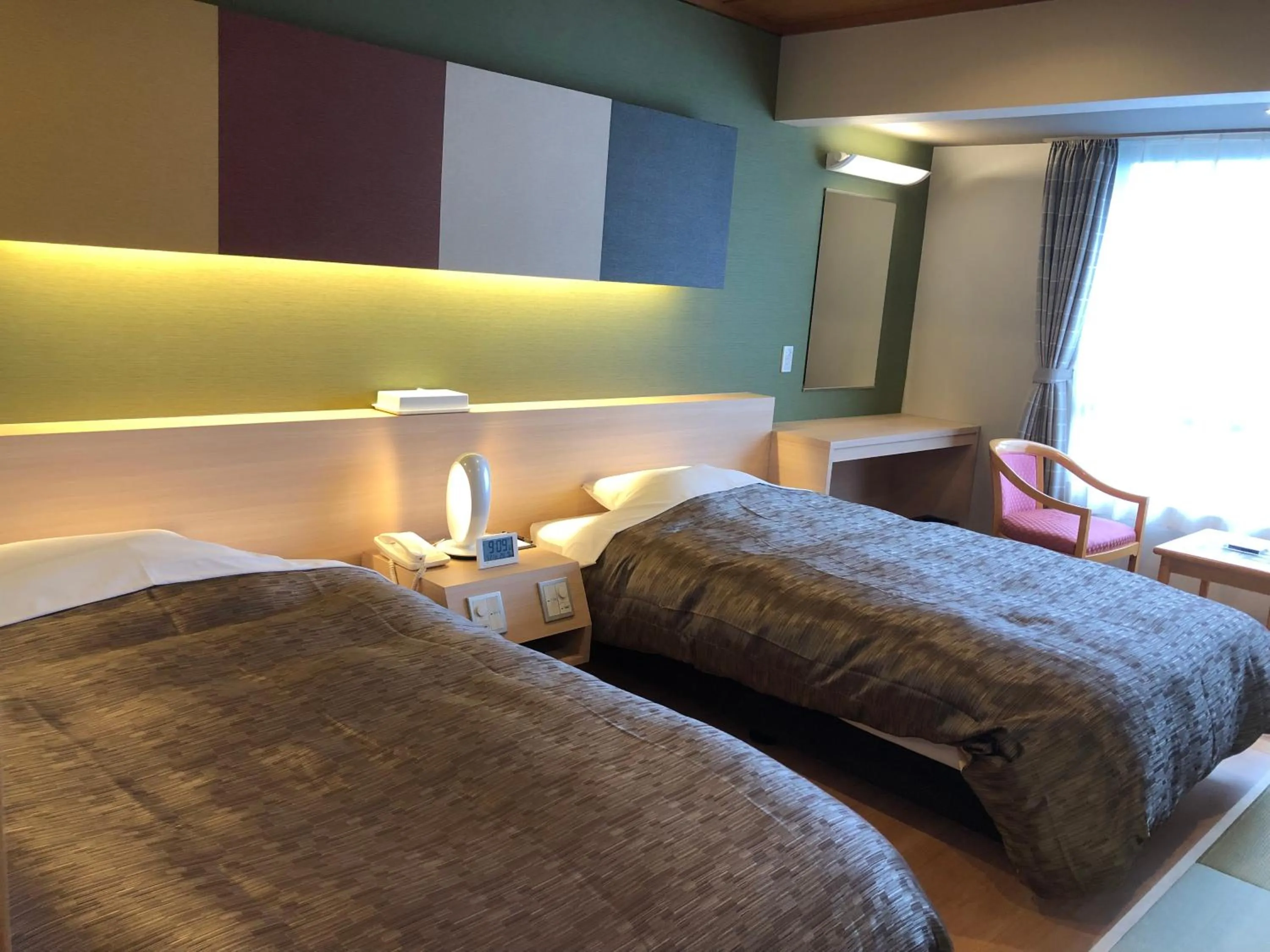 Bed in Kirishima Hotel