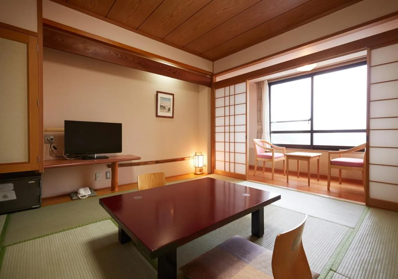 Bed in Kirishima Hotel