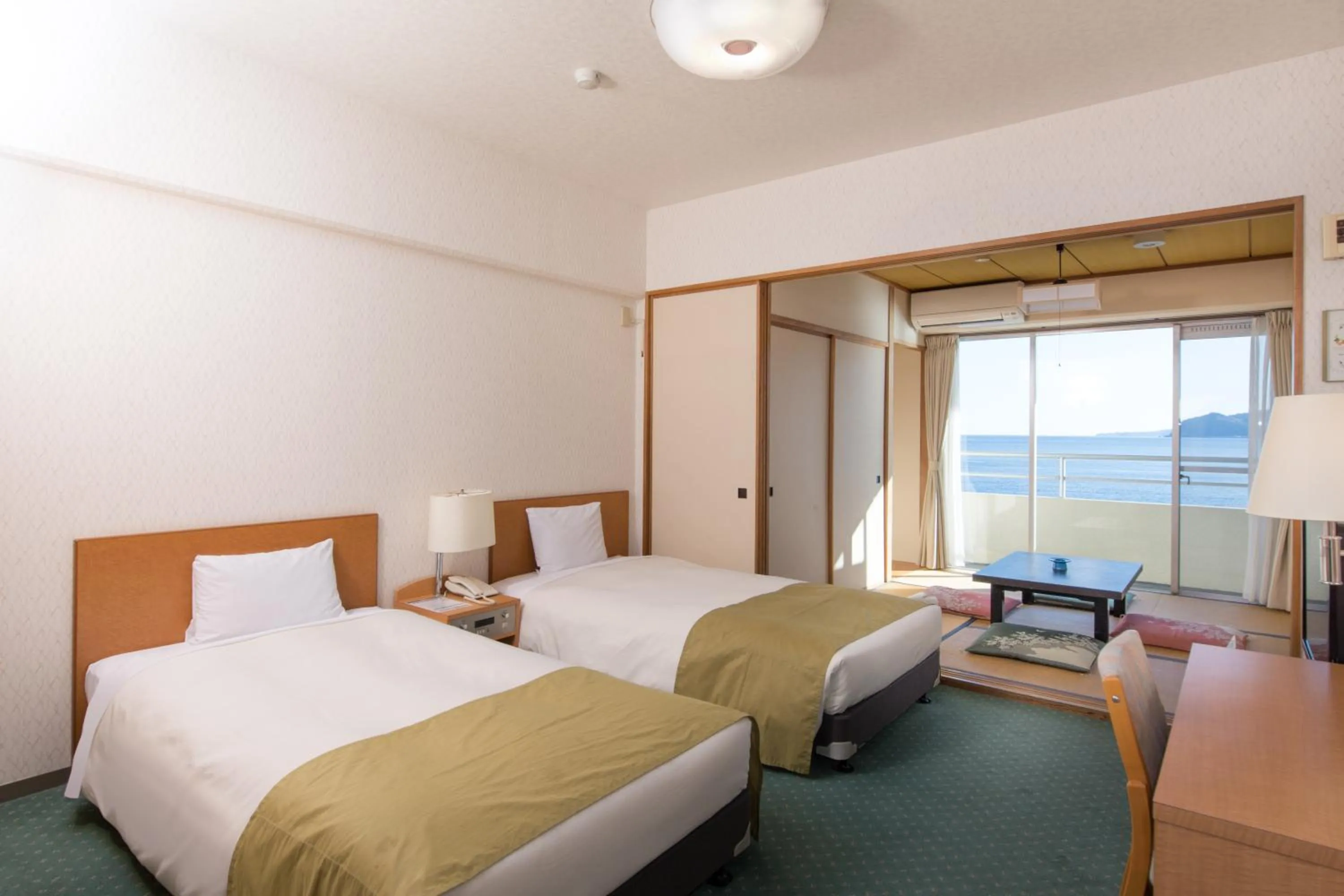 Photo of the whole room, Bed in Wisterian Life Club Atami