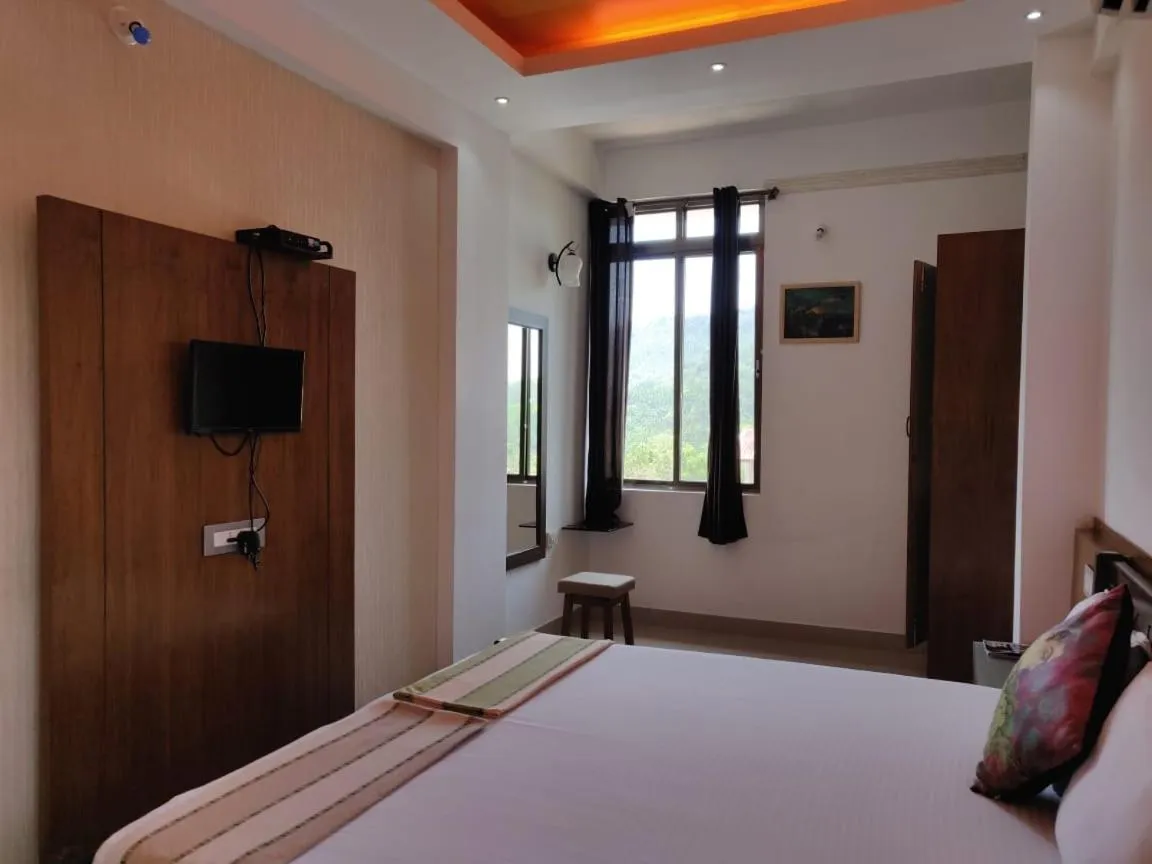 Bed in Hotel Mudra Midtown