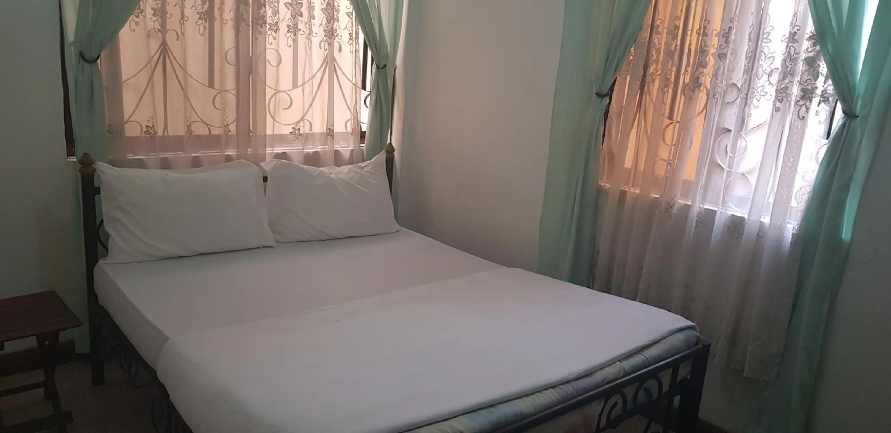 Bed in Bright Star Hotel & Safaris