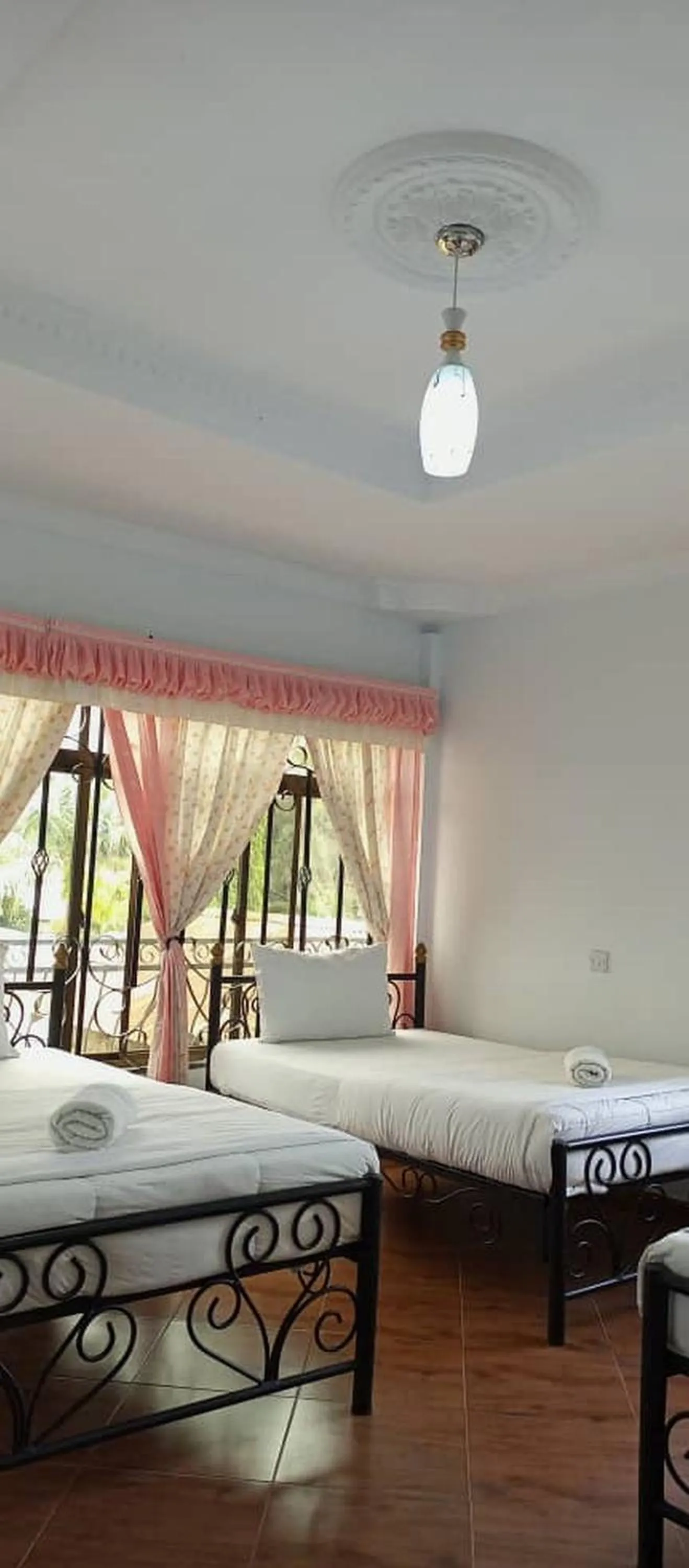 Bed in Bright Star Hotel & Safaris