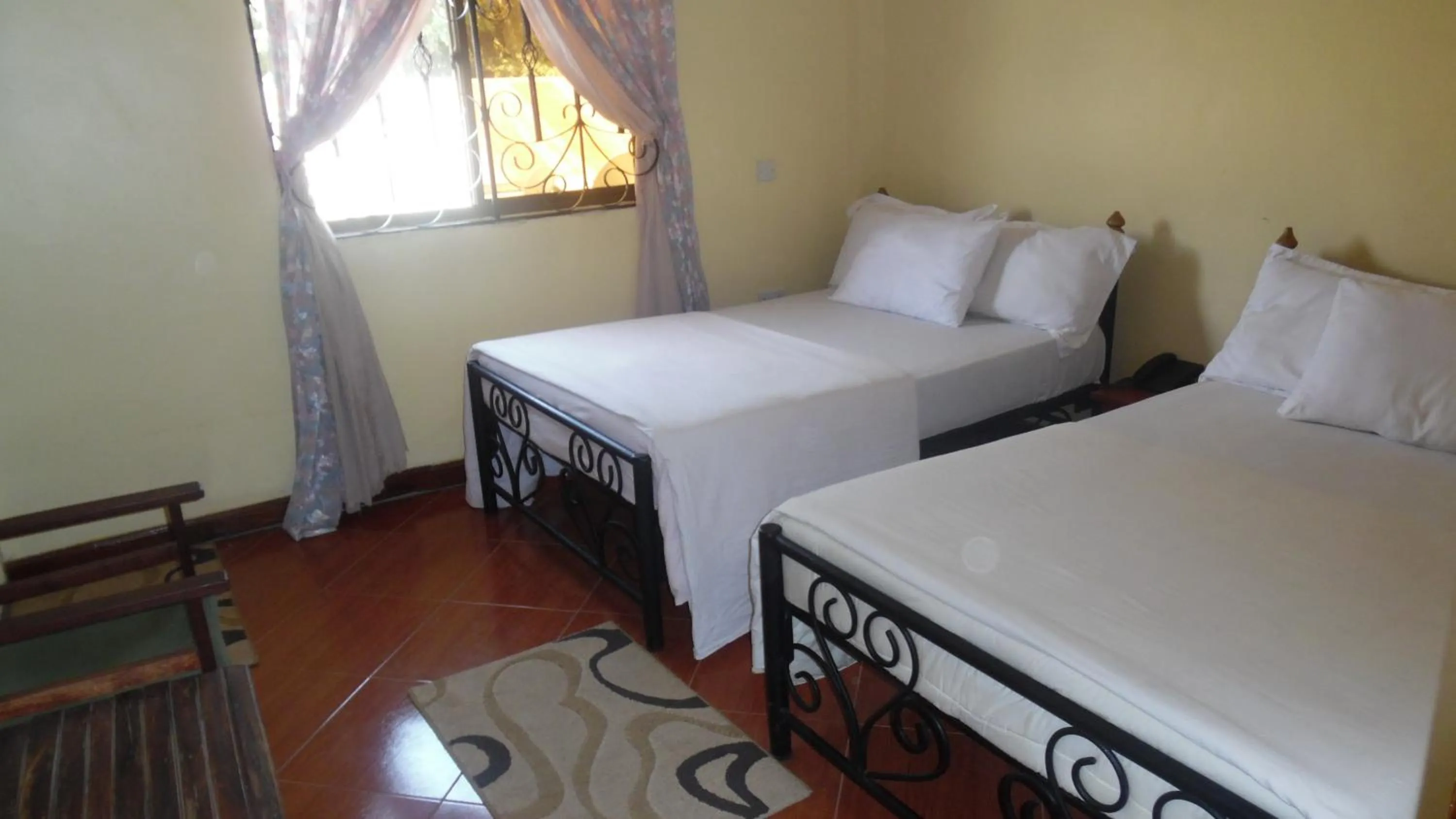 Photo of the whole room, Bed in Bright Star Hotel & Safaris