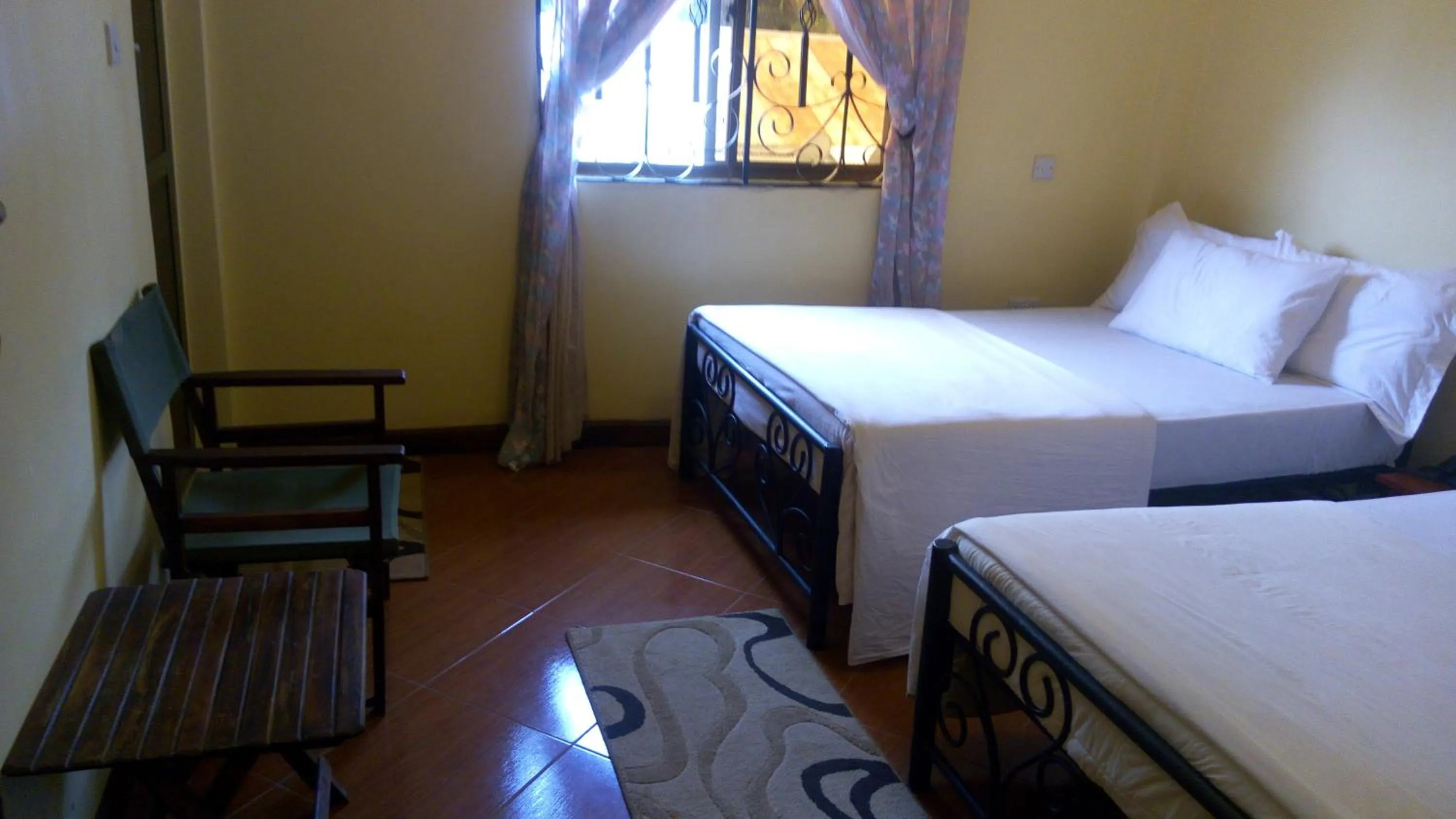 Photo of the whole room, Bed in Bright Star Hotel & Safaris