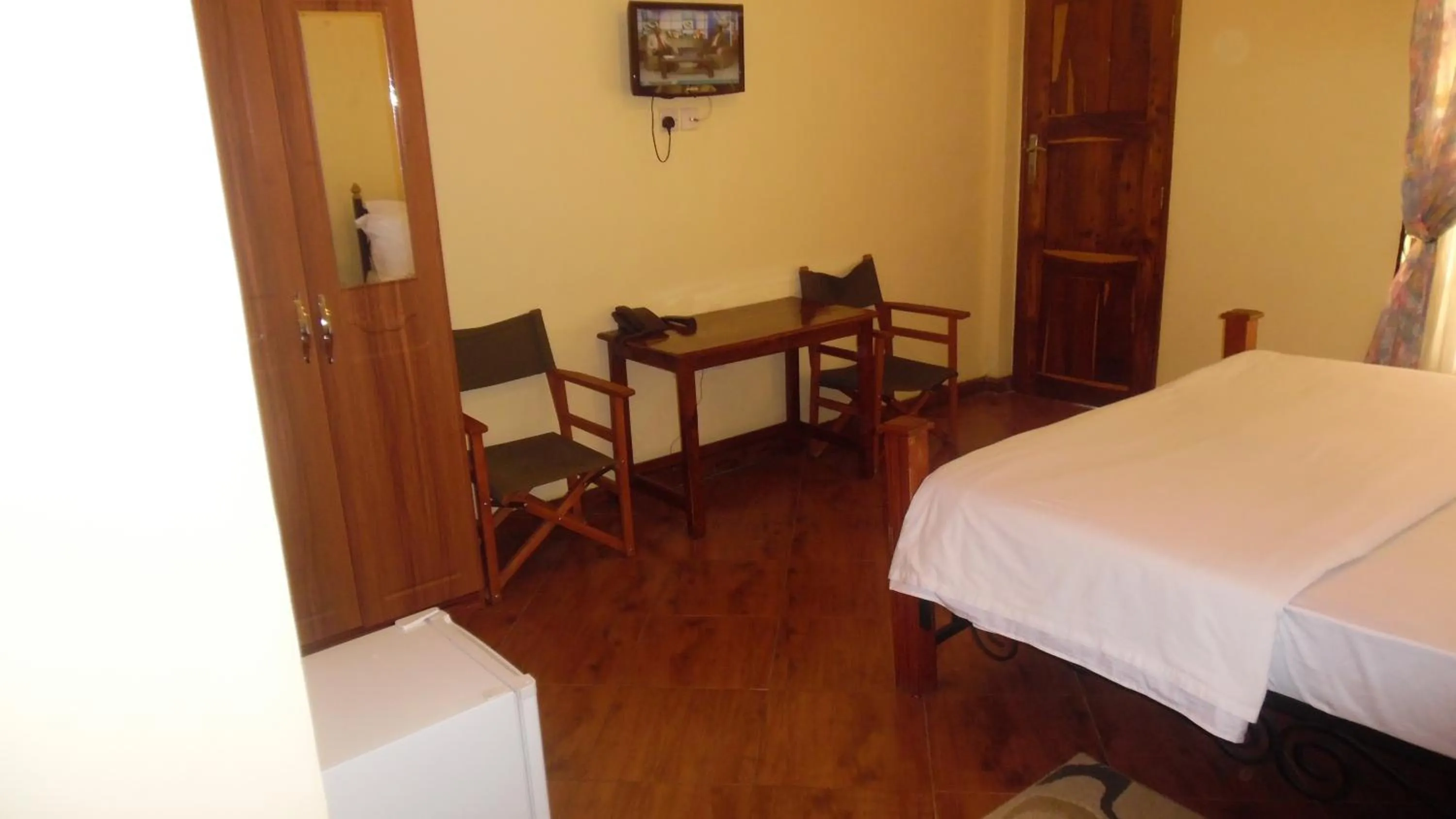Photo of the whole room, Bed in Bright Star Hotel & Safaris