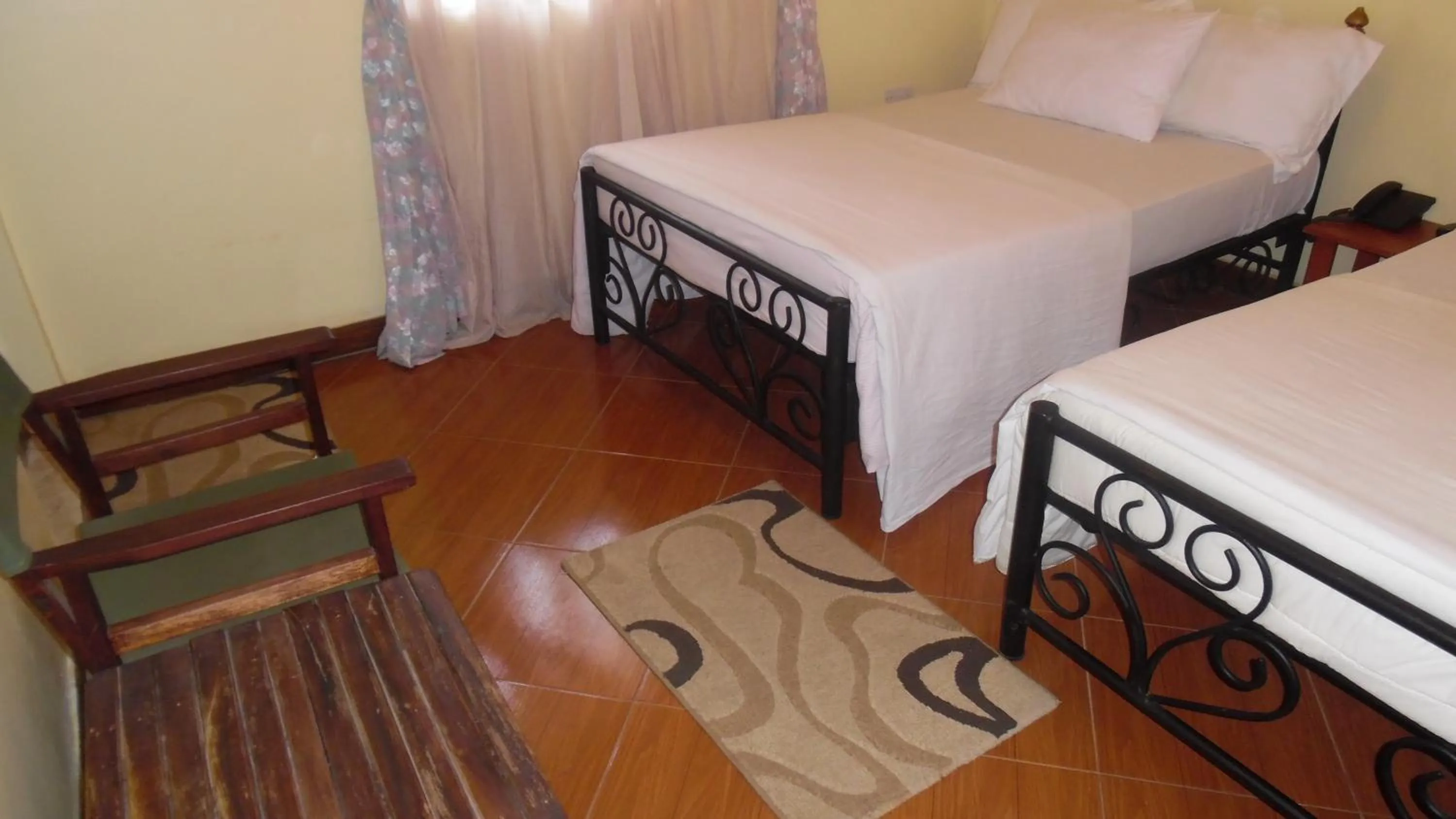 Photo of the whole room, Bed in Bright Star Hotel & Safaris