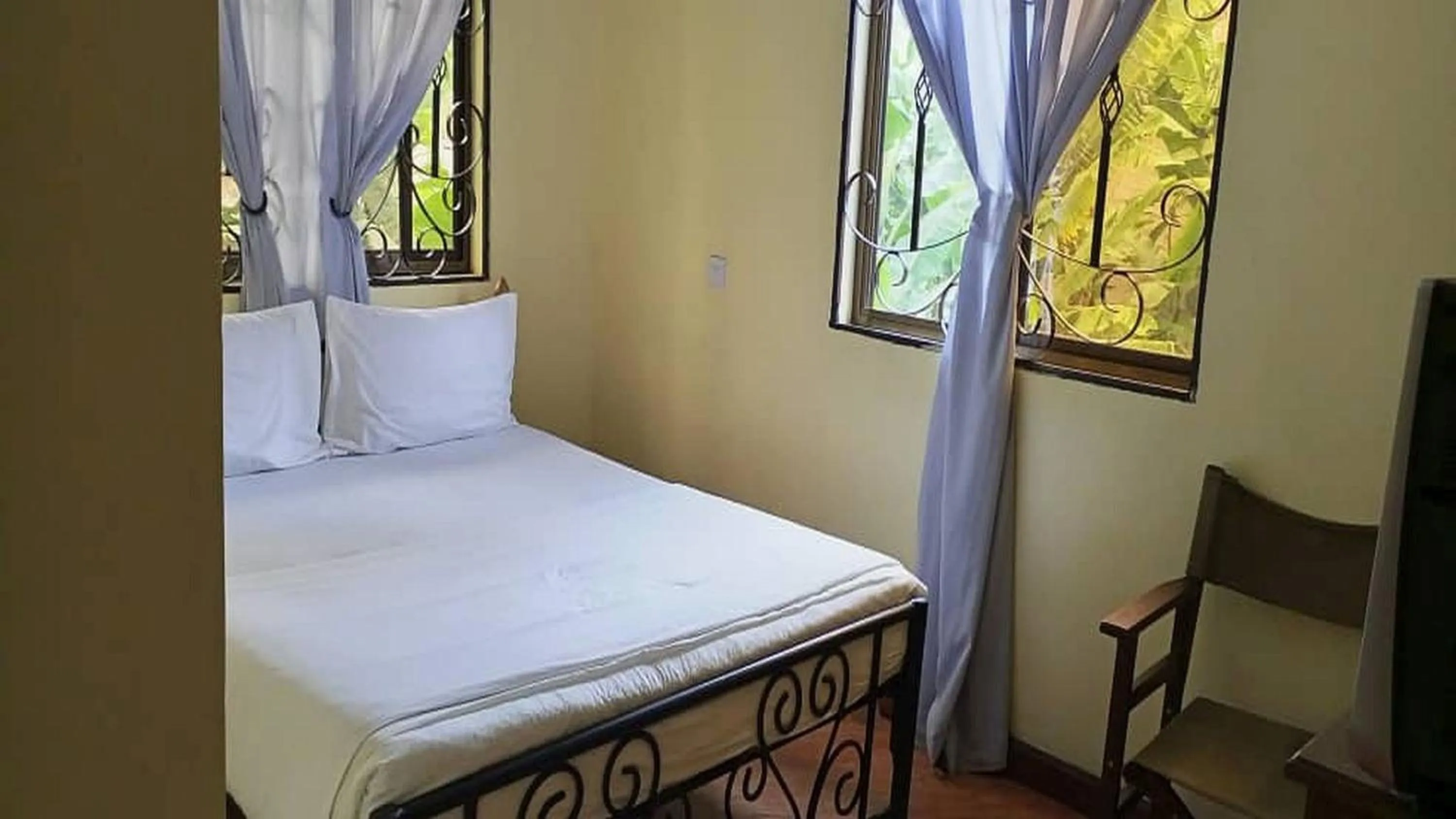 Bed in Bright Star Hotel & Safaris