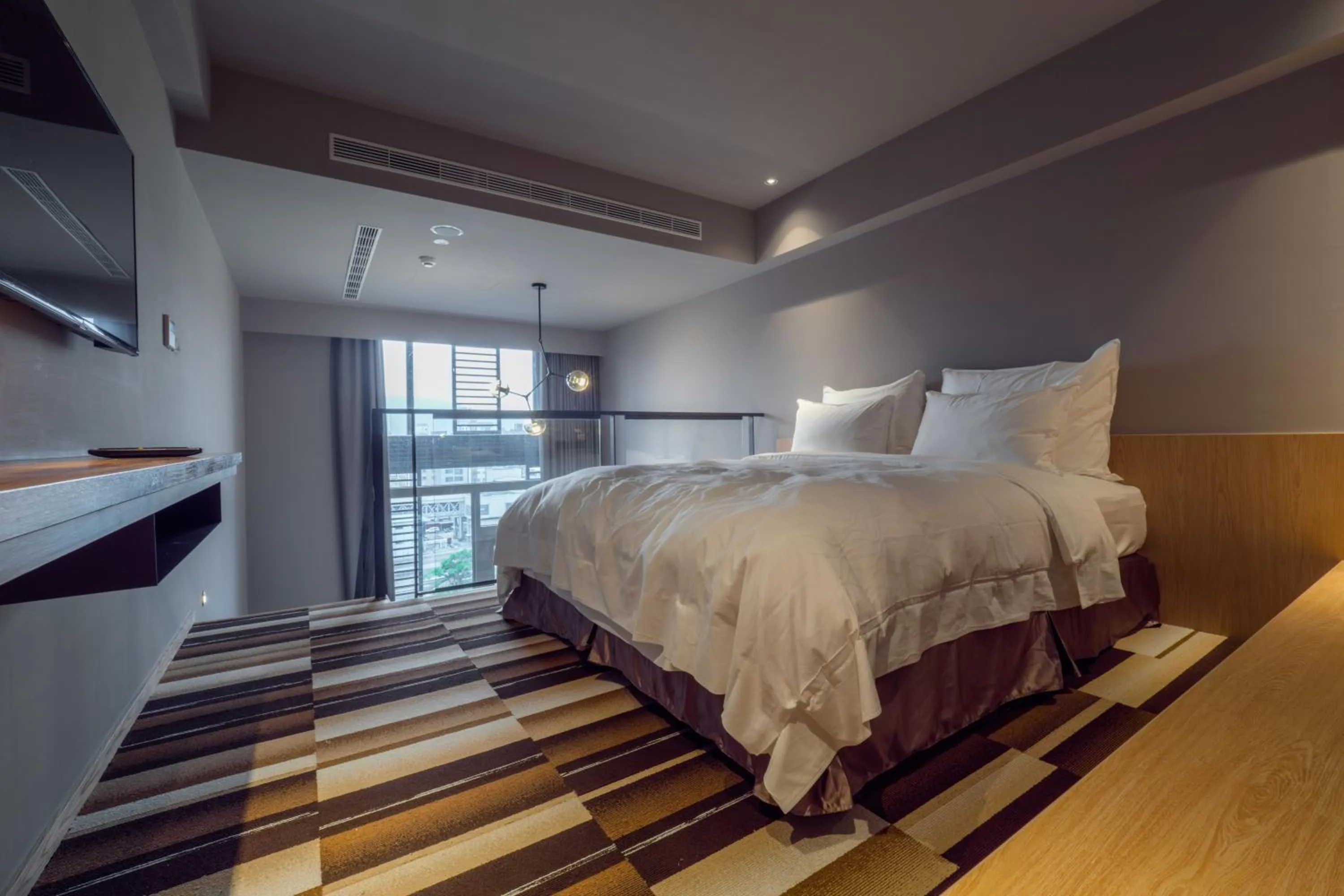 Bed in Watermark Hotel Kaohsiung Main Station