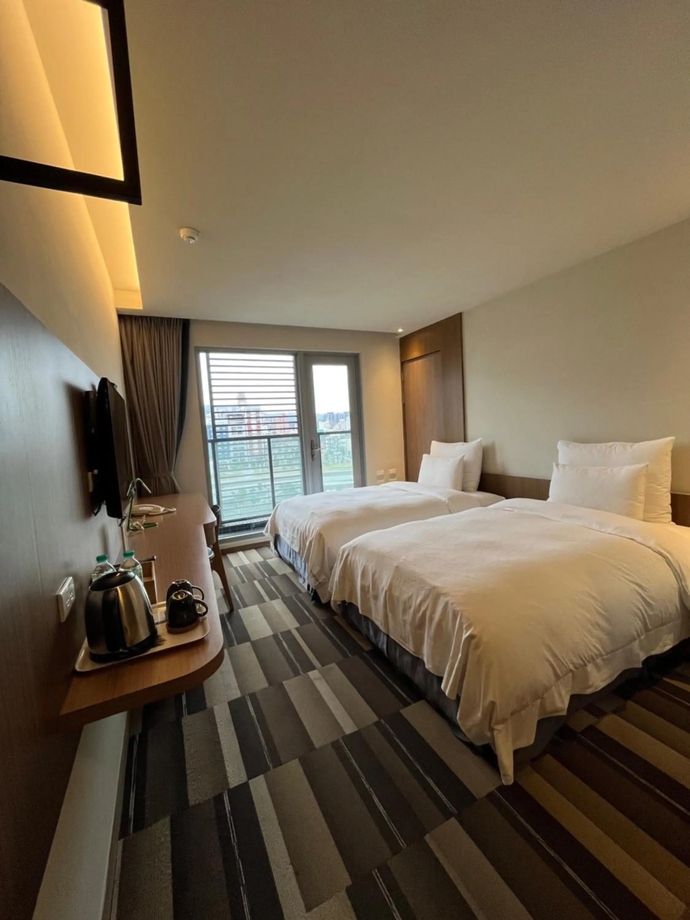 Bed in Watermark Hotel Kaohsiung Main Station