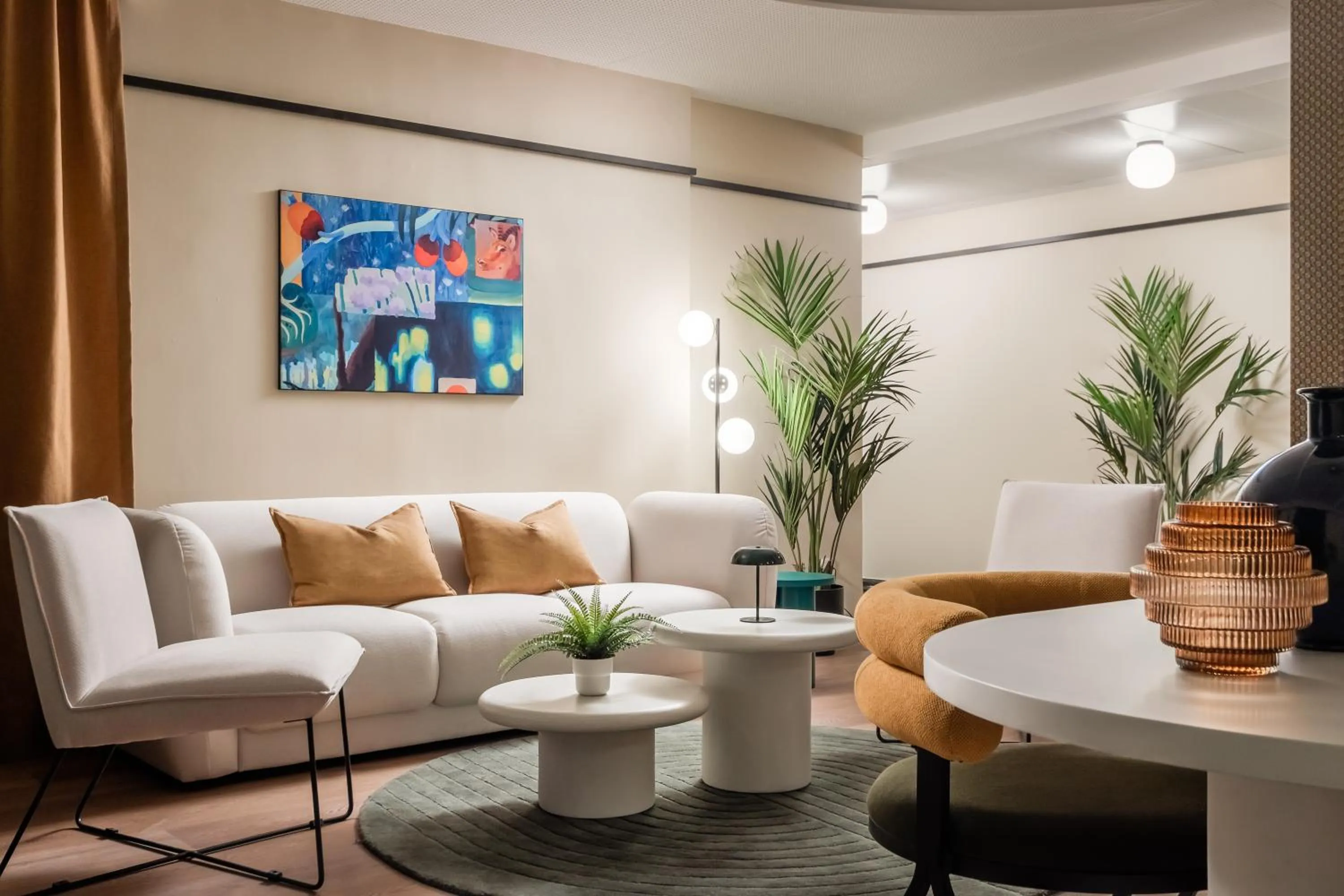 Seating area in BYPILLOW Amari